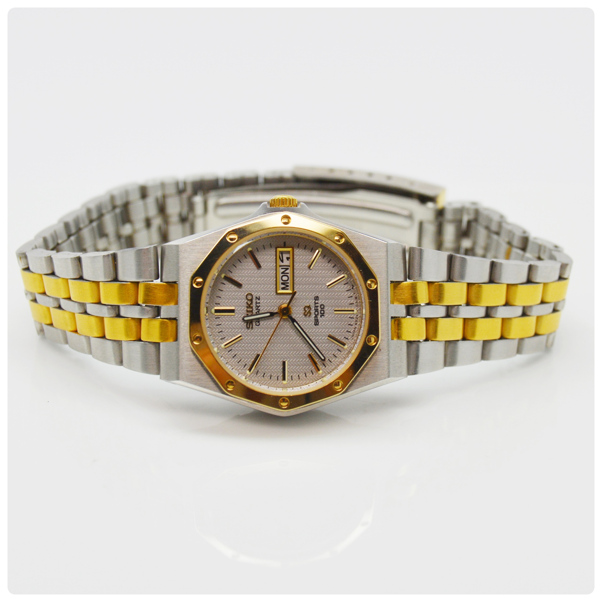 Seiko Quartz Sports 100 Stainless Steel and Gold Plate Watch