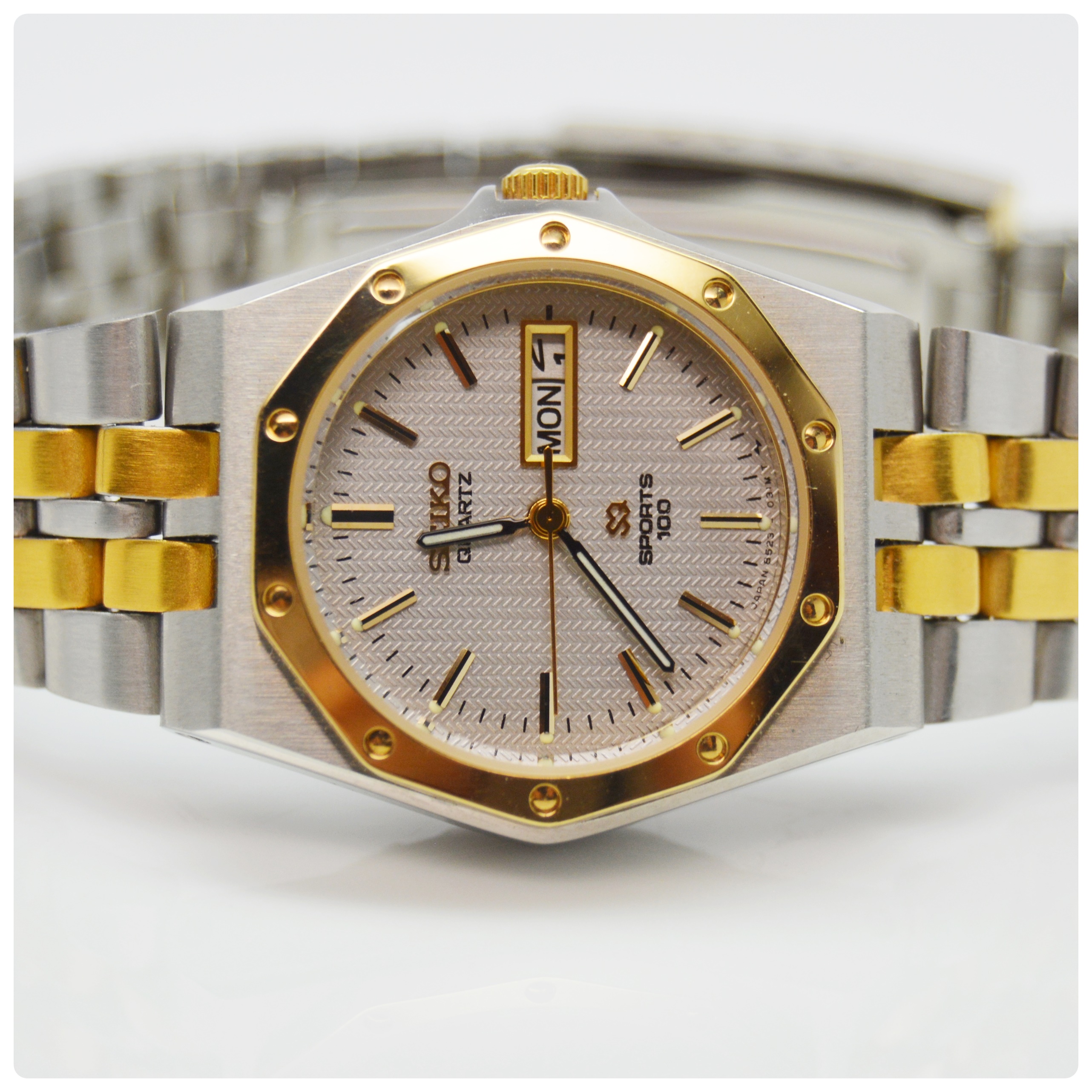 Seiko Quartz Sports 100 Stainless Steel and Gold Plate Watch