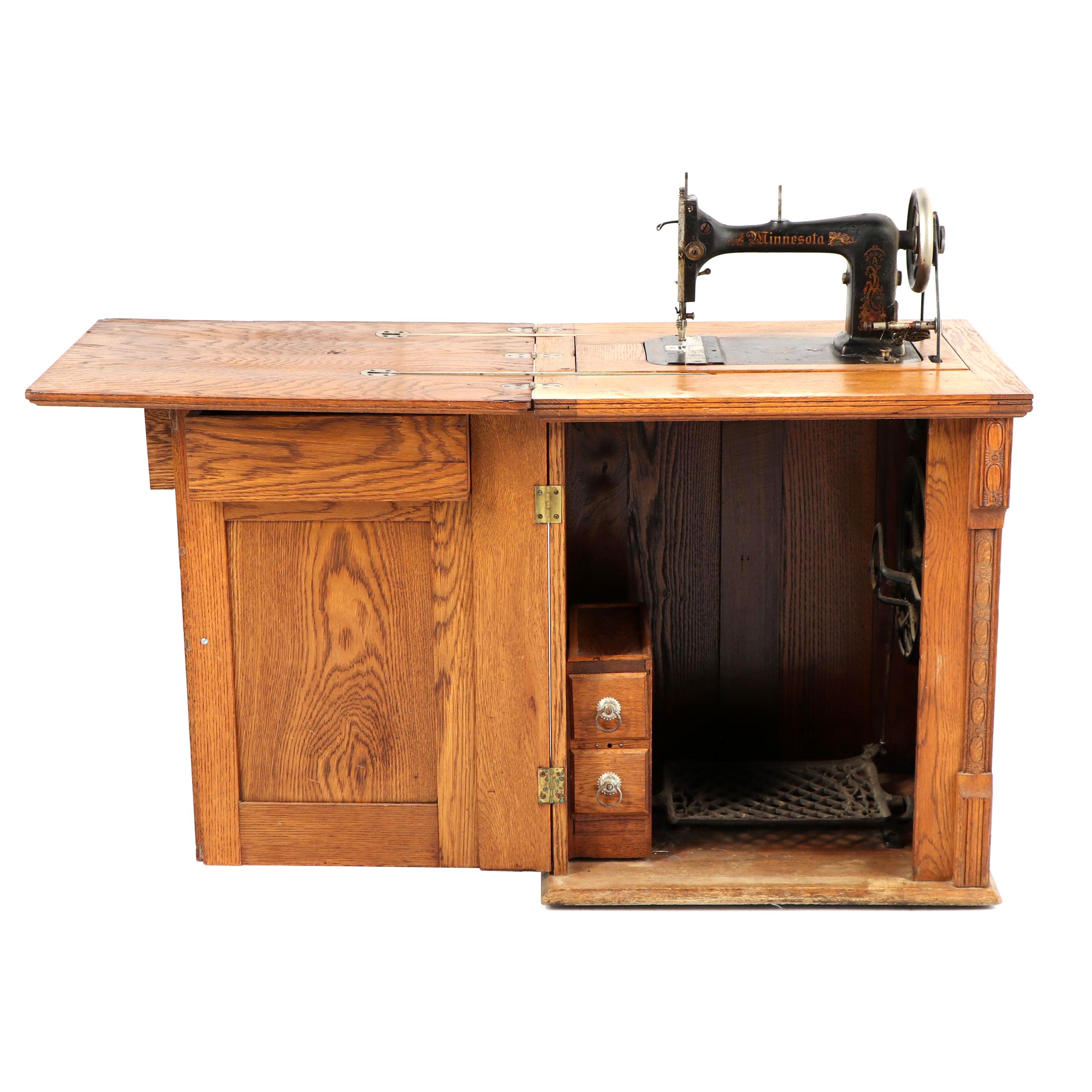 Sears-Roebuck Minnesota Model A Sewing Machine in Eastlake Style Oak Cabinet