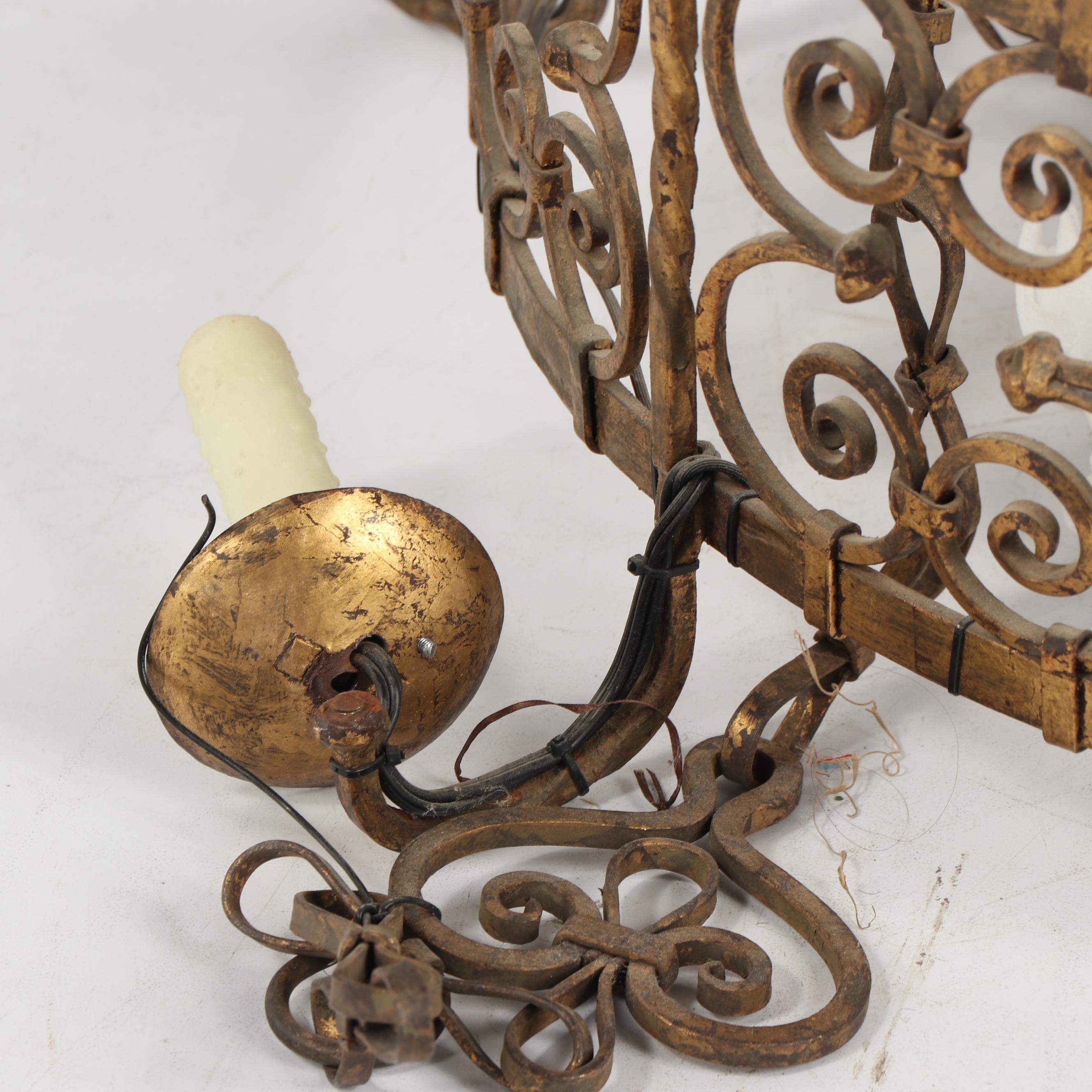 Vintage Seven Light Scrolled Wrought Metal Chandelier with Fleur de Lis Crown