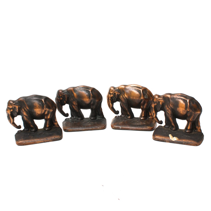 Four Brass Elephant Bookends