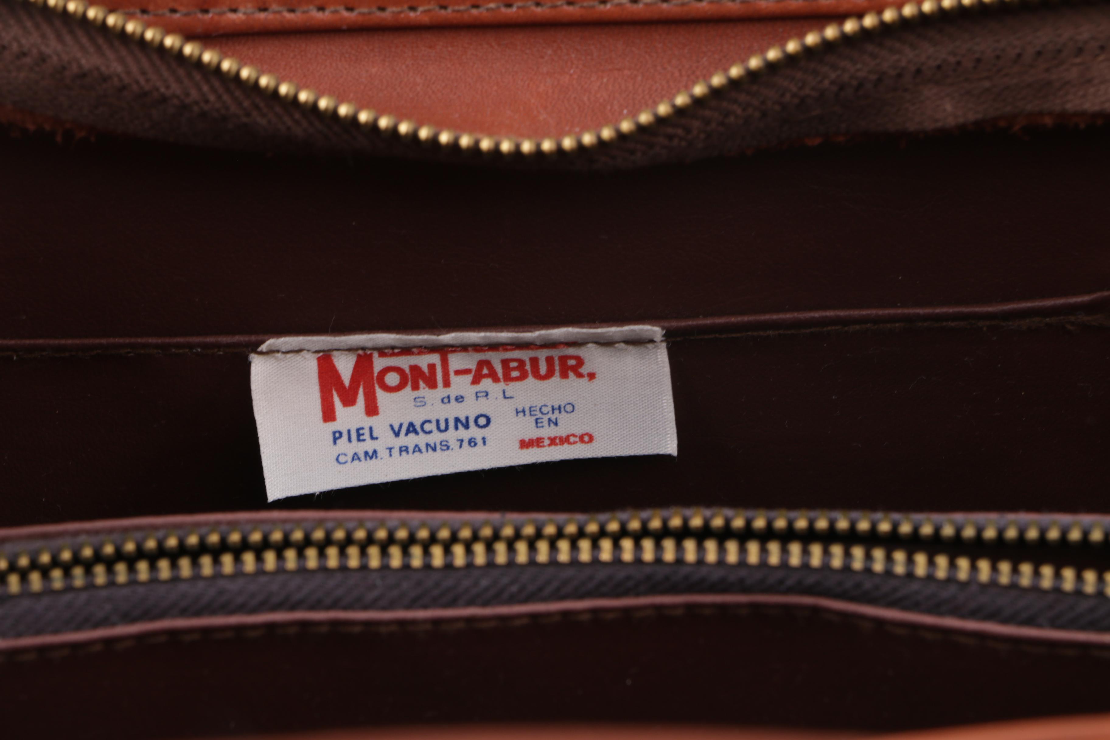 Circa 1970s Vintage Mont-Abur Tooled Leather Aztec Themed Handbag