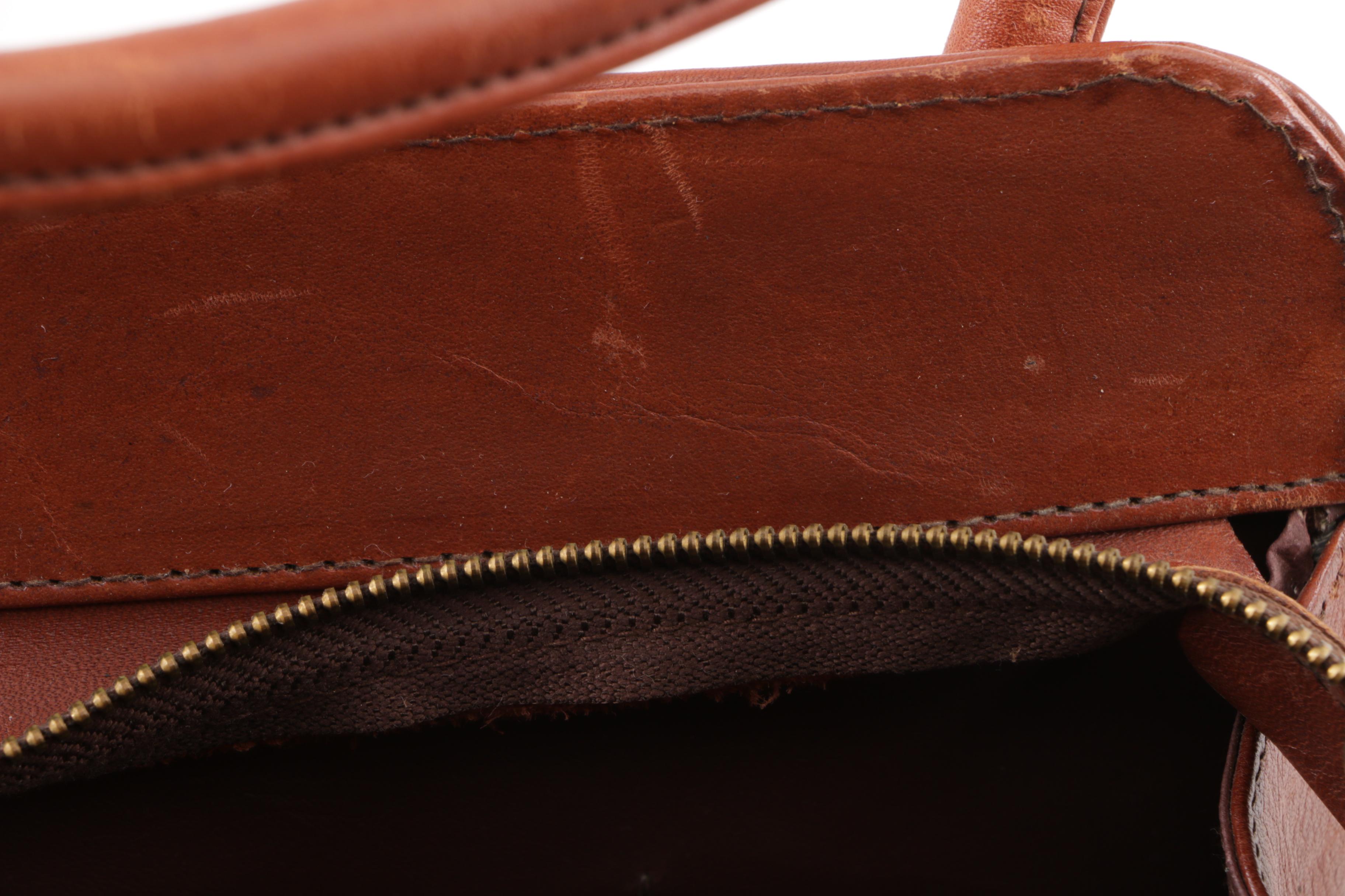 Circa 1970s Vintage Mont-Abur Tooled Leather Aztec Themed Handbag