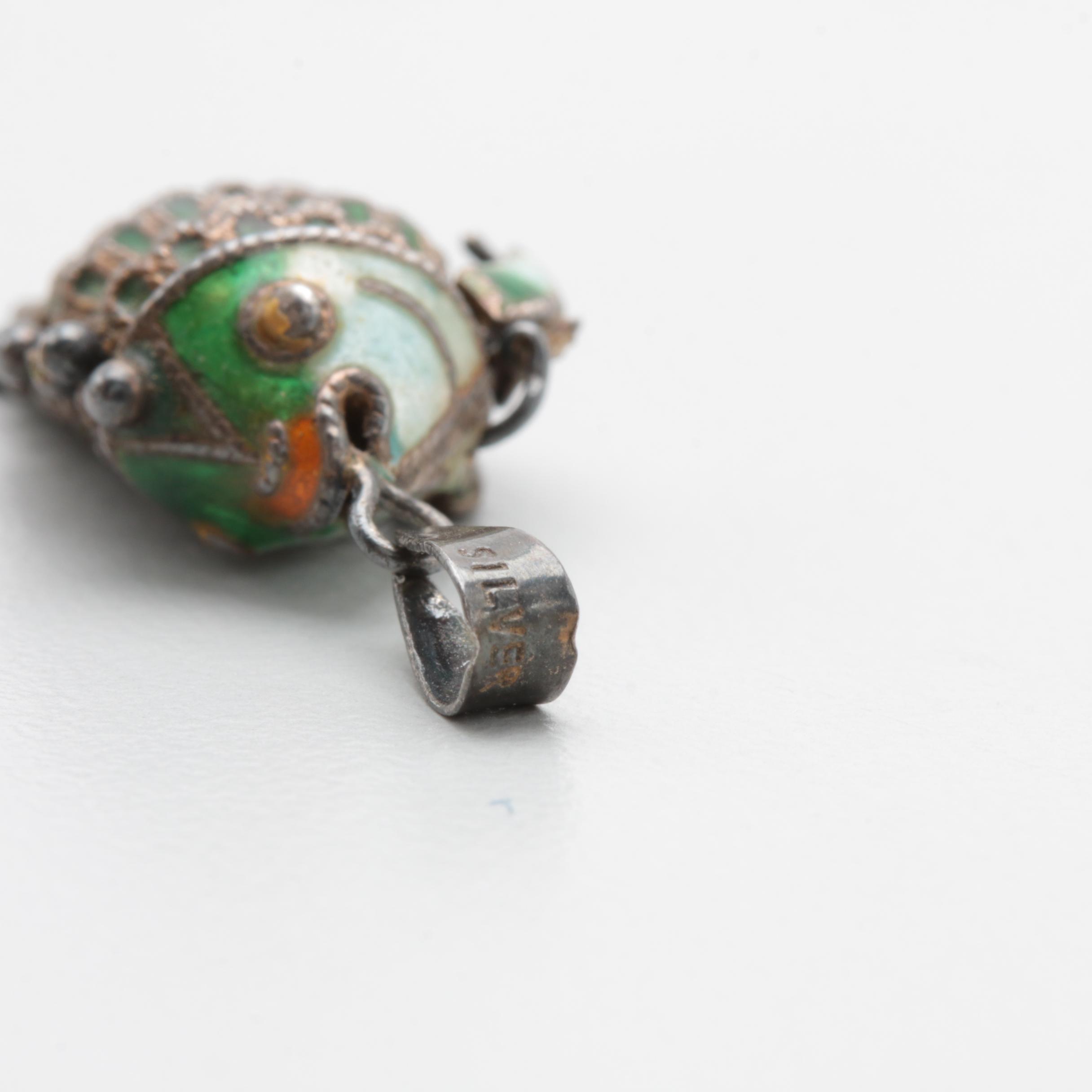 Sterling Silver Brooches and Pendants Featuring Gold Wash and Filigree Accents