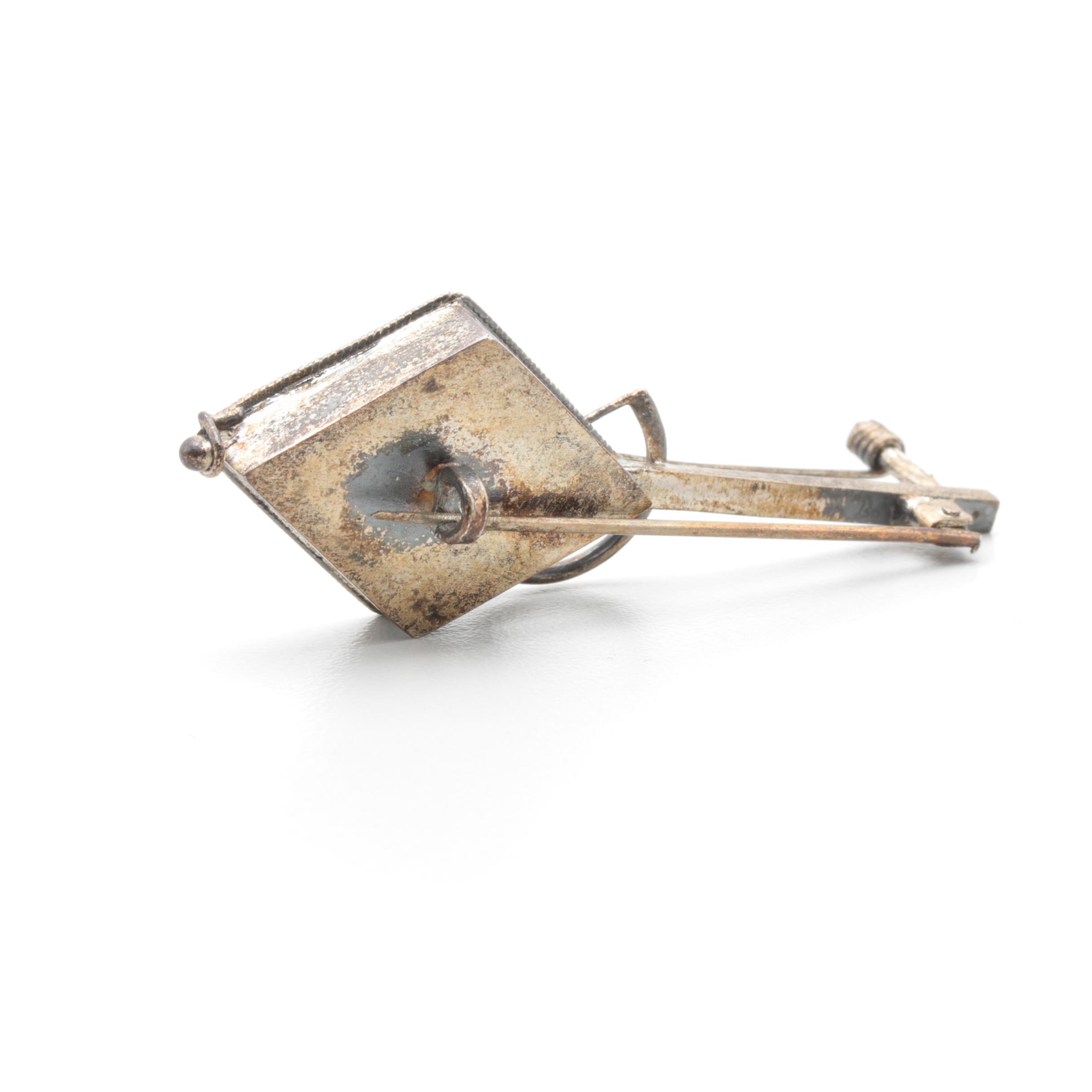 Sterling Silver Brooches and Pendants Featuring Gold Wash and Filigree Accents