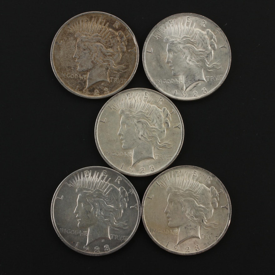 Five 1923 Peace Silver Dollars