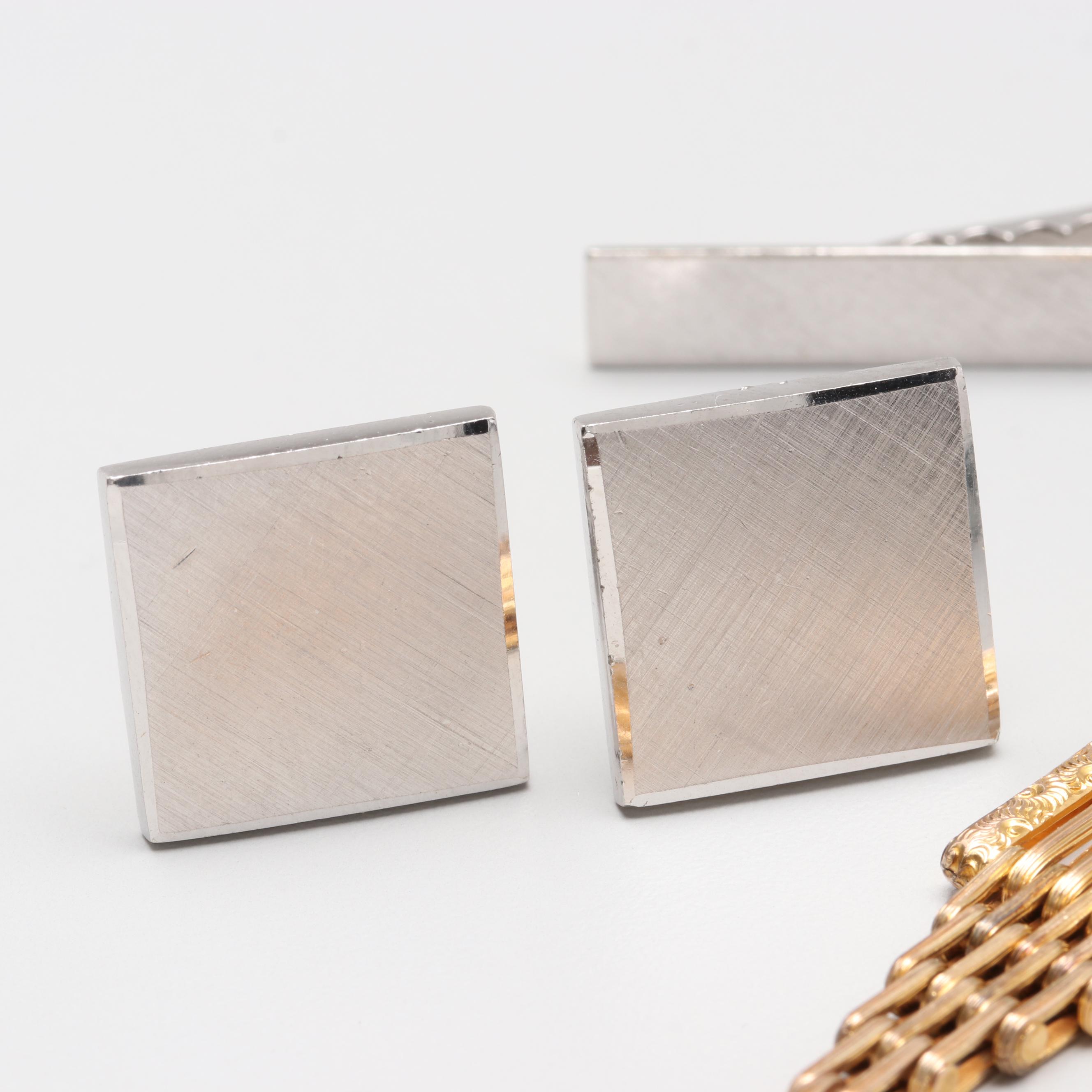 Assortment of Gold Tone and Silver Tone Costume Jewelry