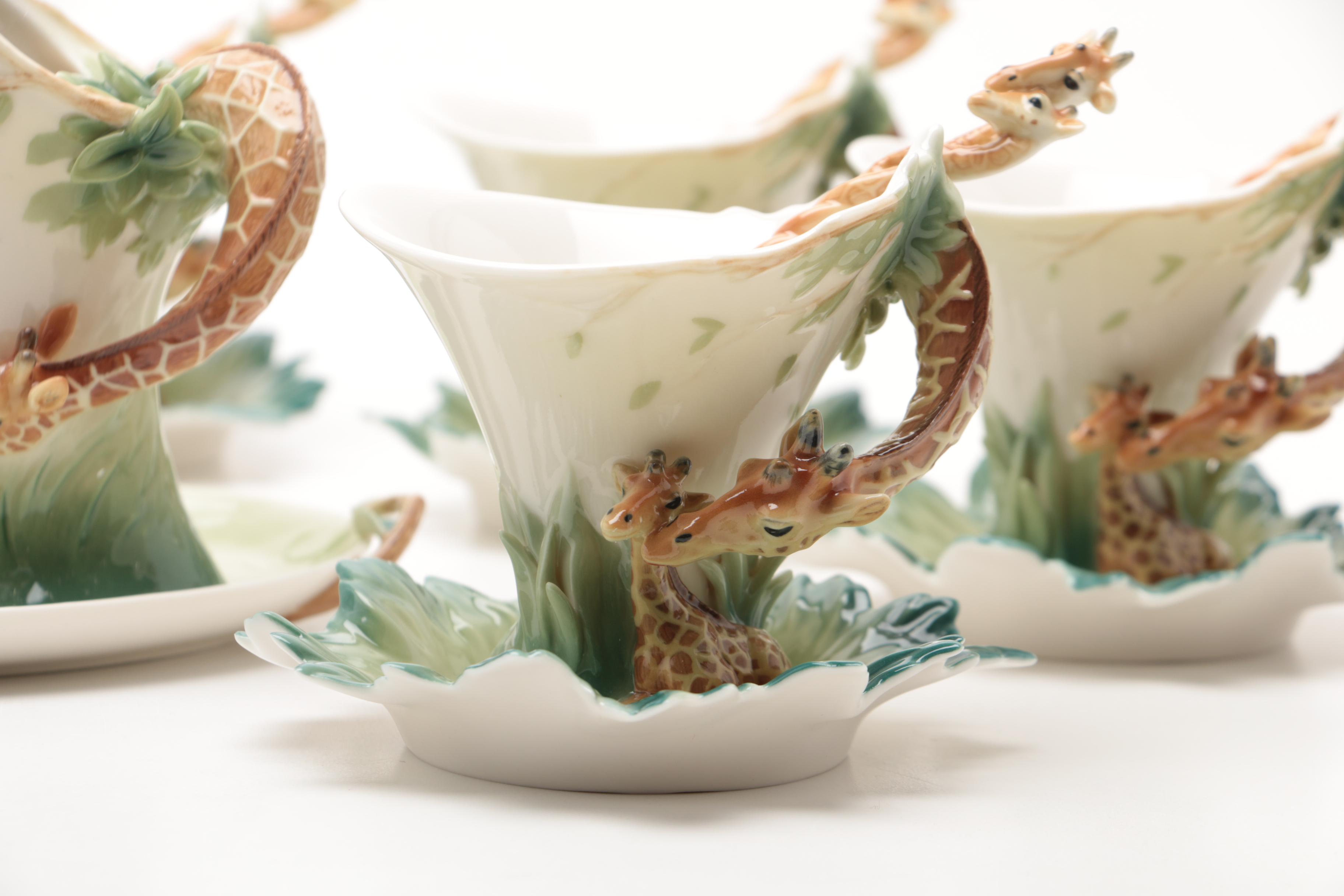 Franz "Giraffe" Porcelain Sculptured Cups And Saucers And Serving Pieces