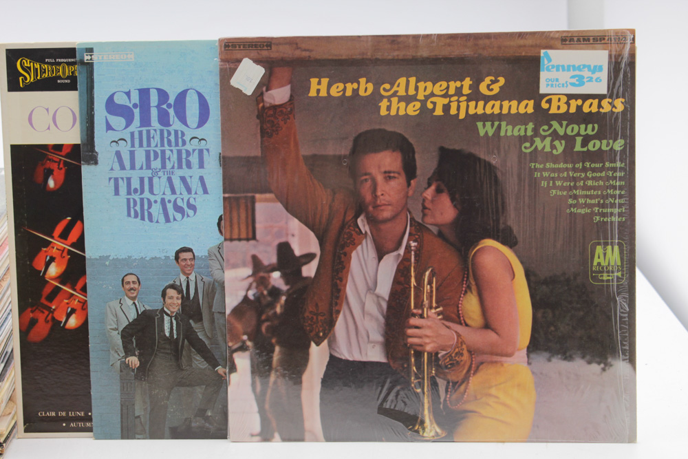 Assorted Vintage Records Featuring Nat King Cole and Louis Armstrong