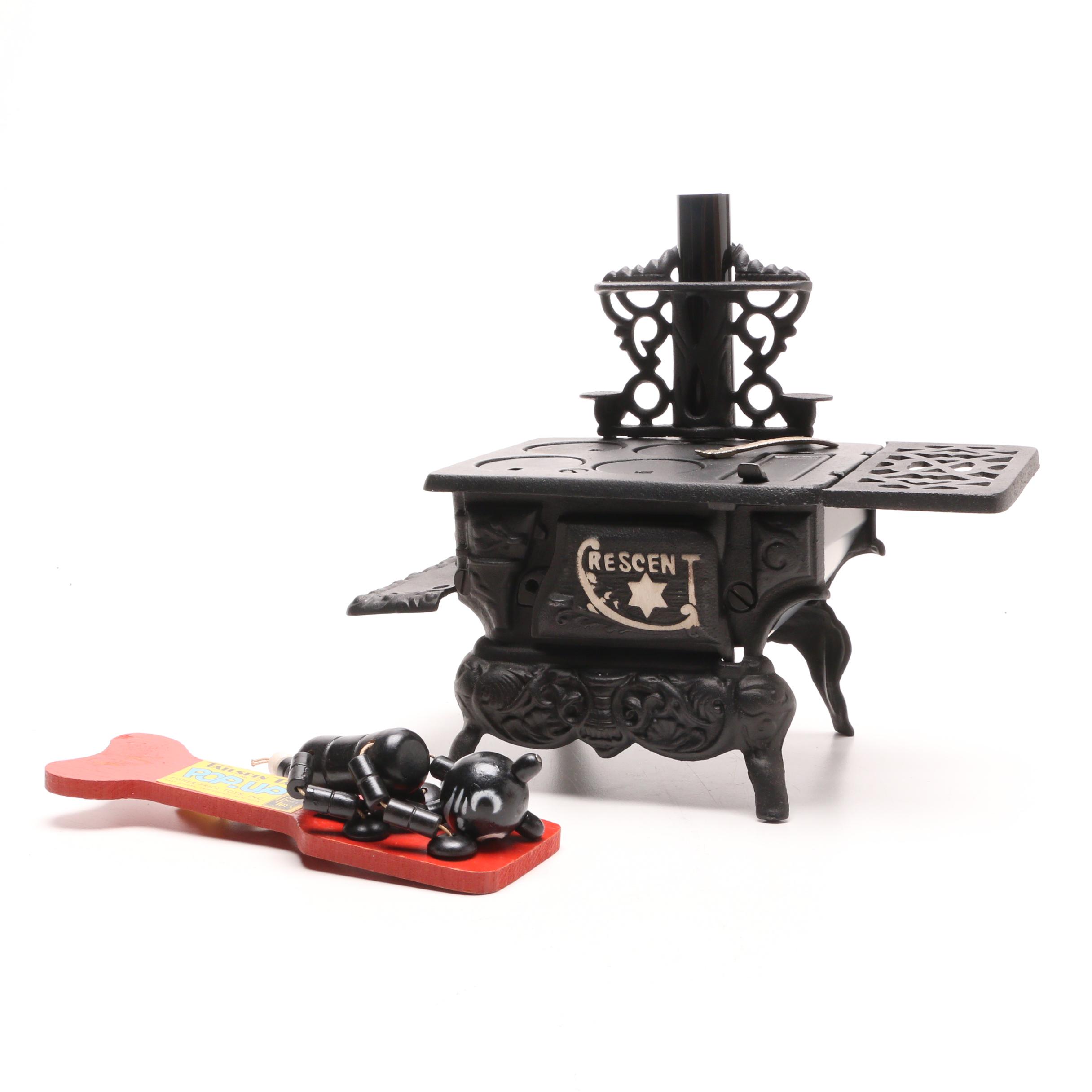 Fisher Price "Tailspin Tabby" Toy with a Greycraft Cast Iron Reproduction Stove