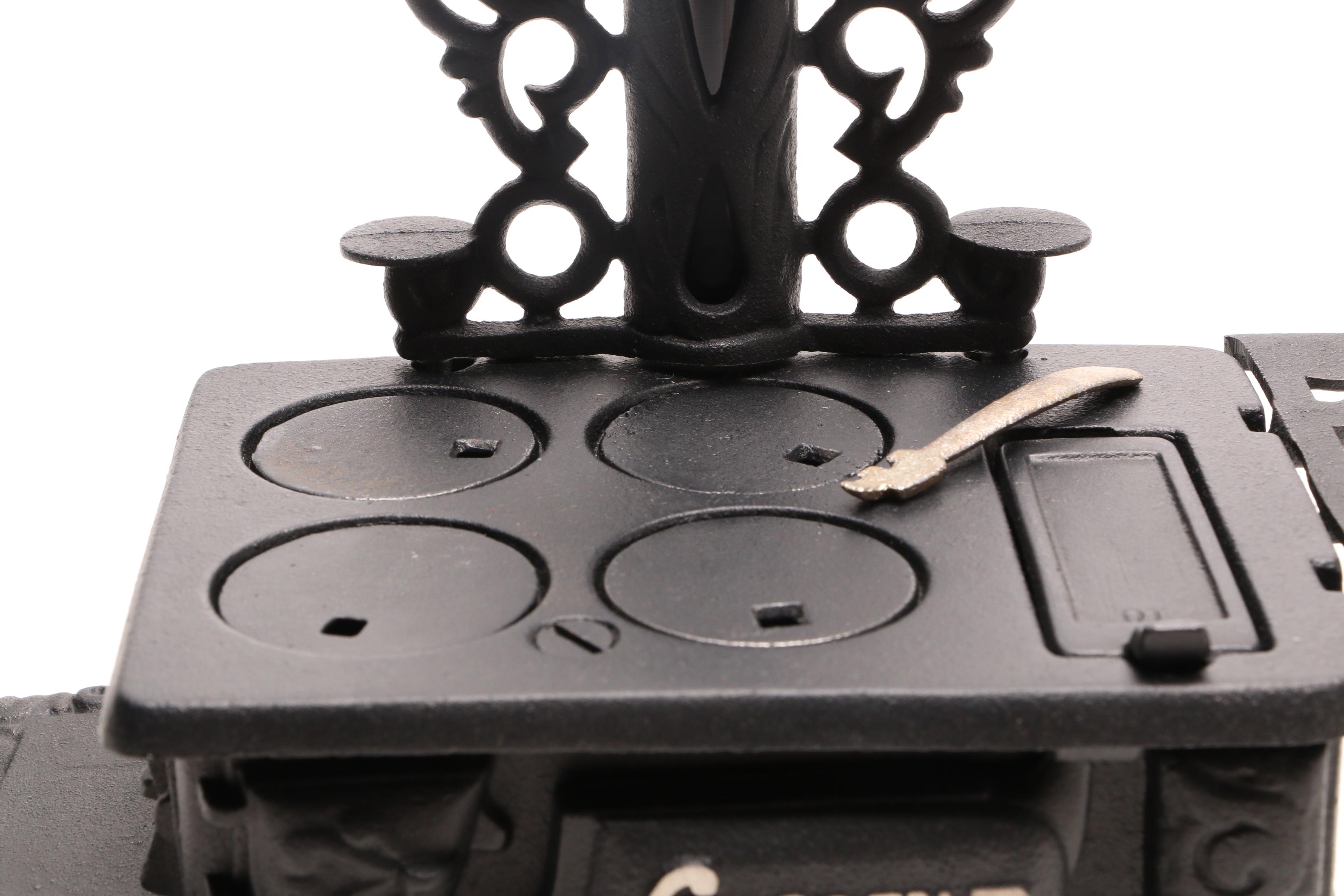 Fisher Price "Tailspin Tabby" Toy with a Greycraft Cast Iron Reproduction Stove