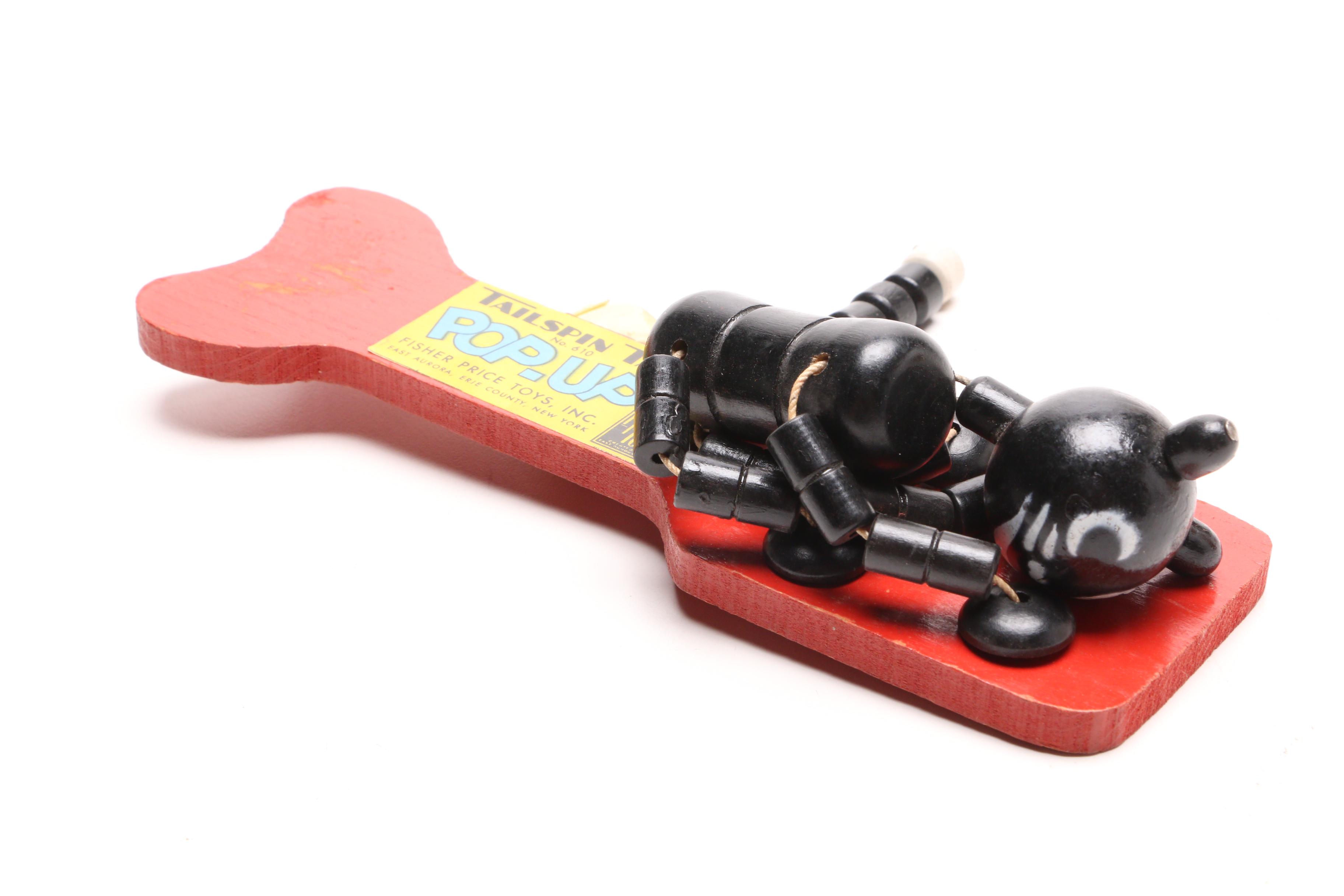 Fisher Price "Tailspin Tabby" Toy with a Greycraft Cast Iron Reproduction Stove