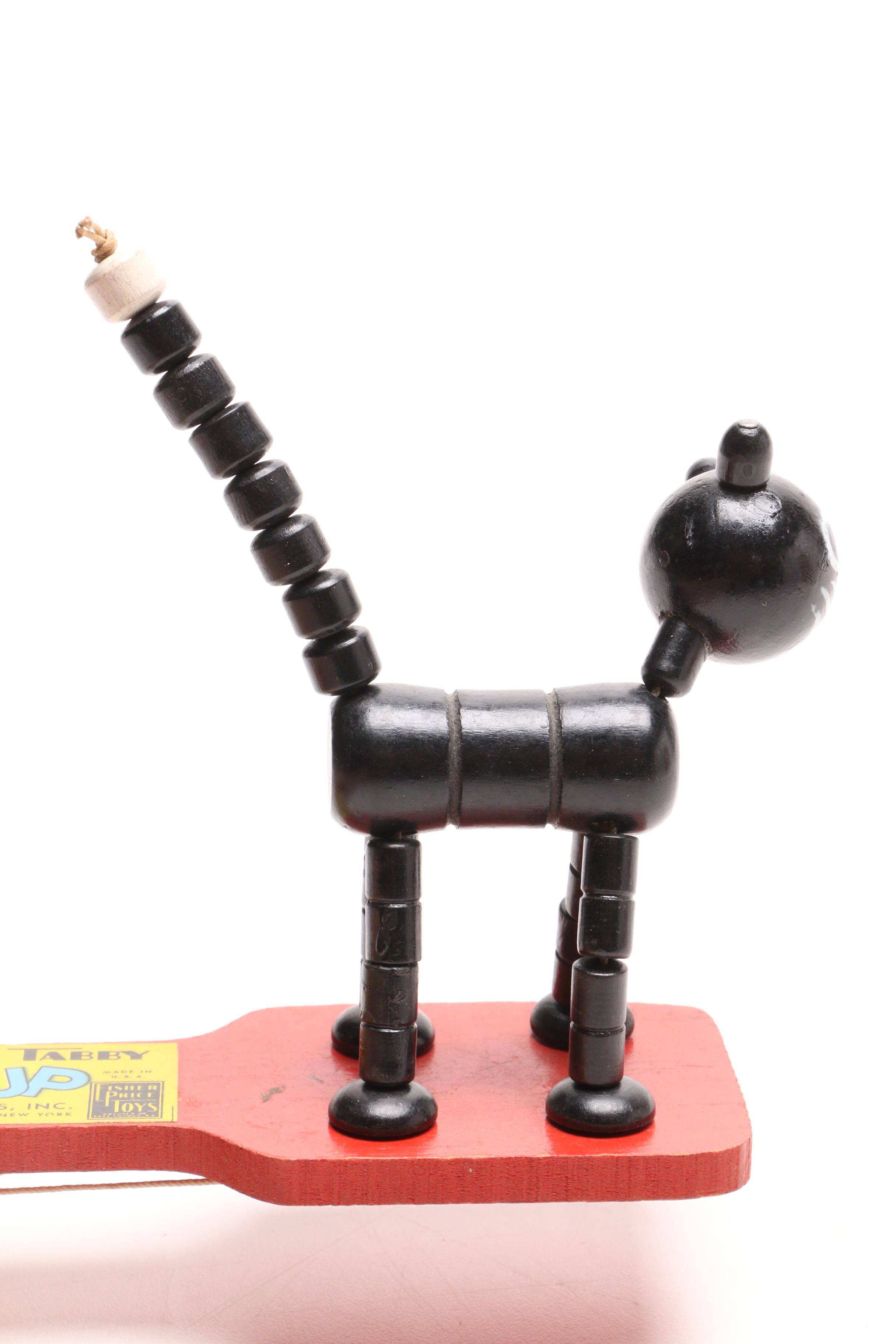 Fisher Price "Tailspin Tabby" Toy with a Greycraft Cast Iron Reproduction Stove