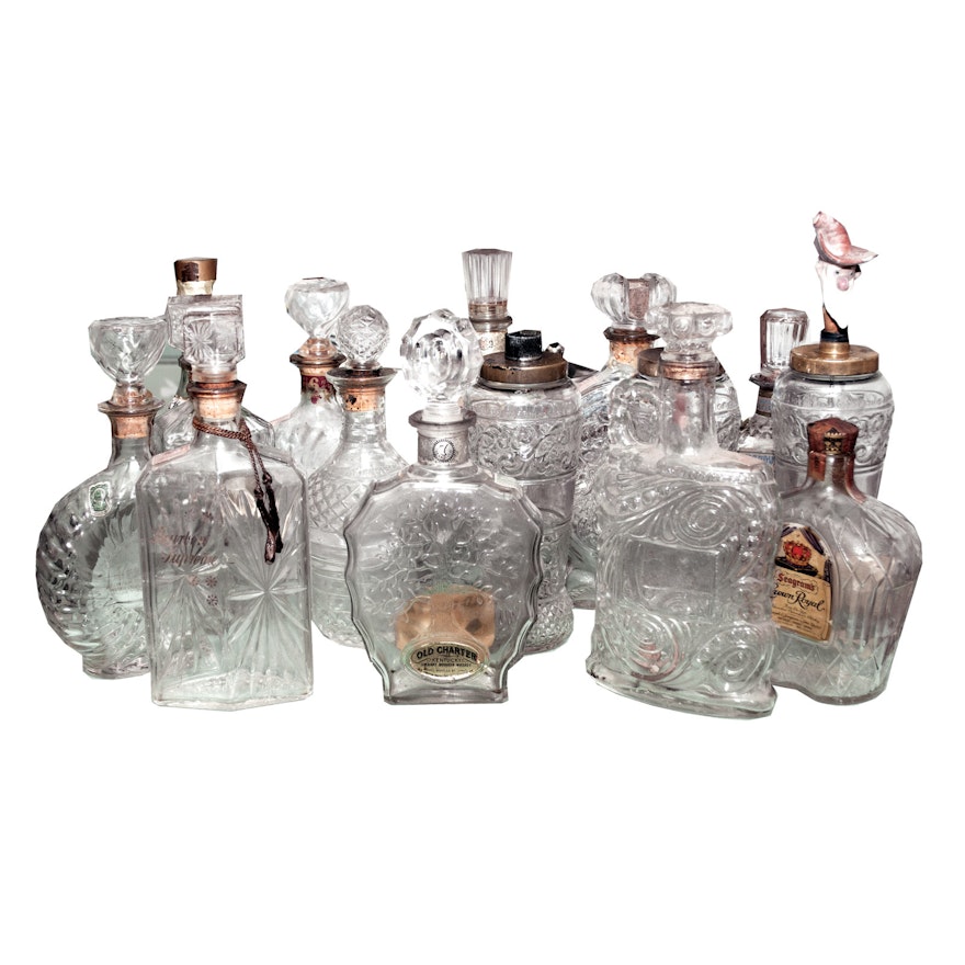 Fifteen Vintage Impressed Glass Liquor Bottles