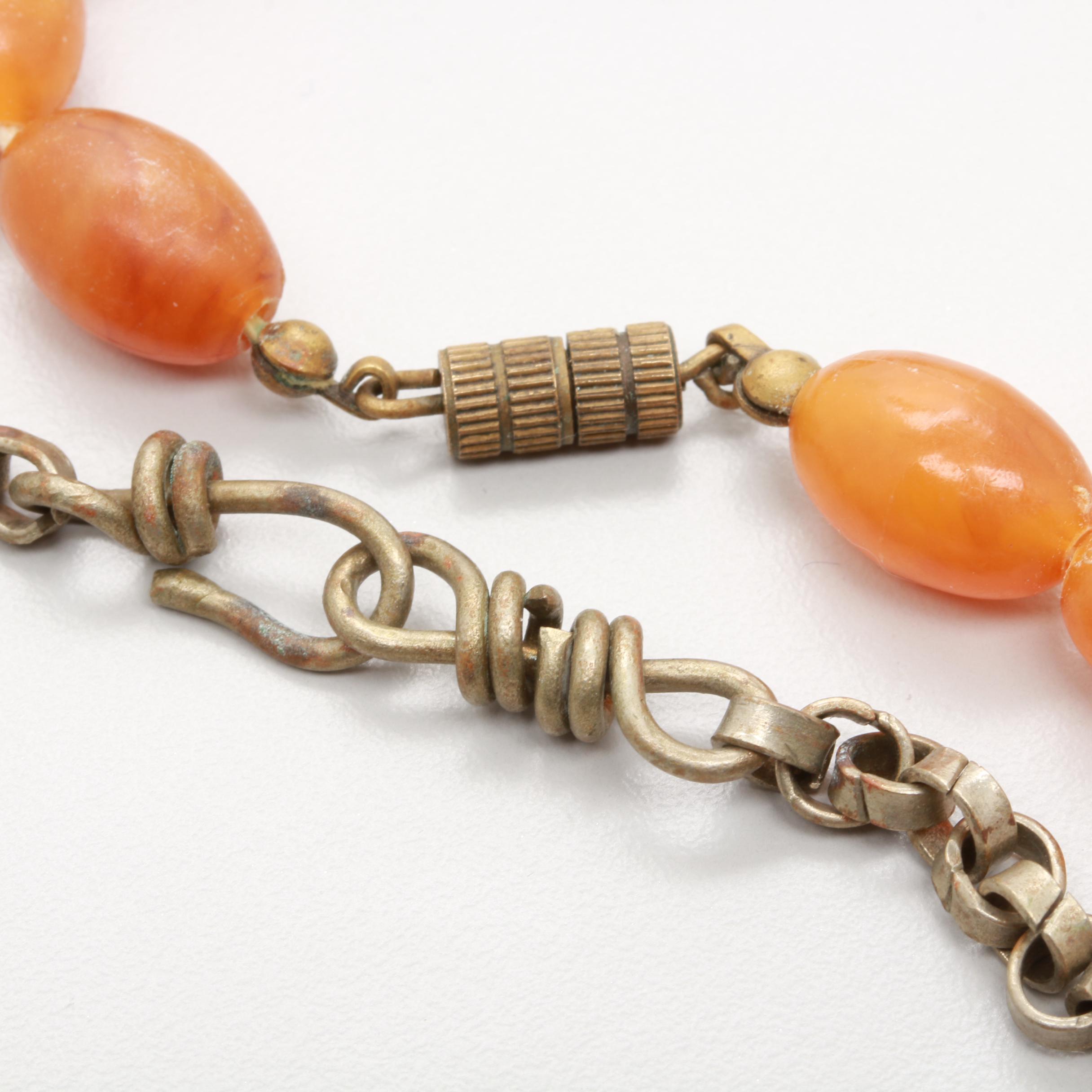 Necklace and Brooch Selection Featuring Copal Resin and Glass