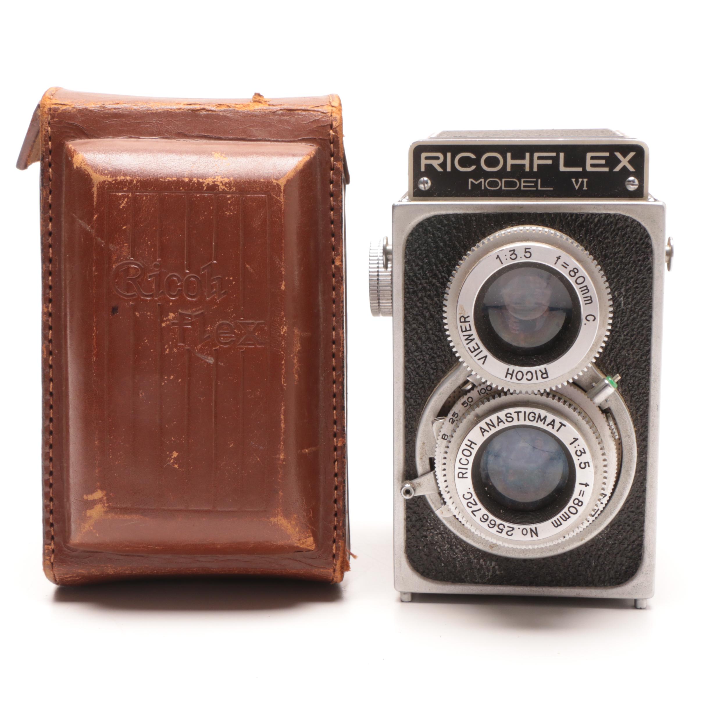 RicohFlex Model VI Camera and Leather Carrier and a Welta Folding Camera