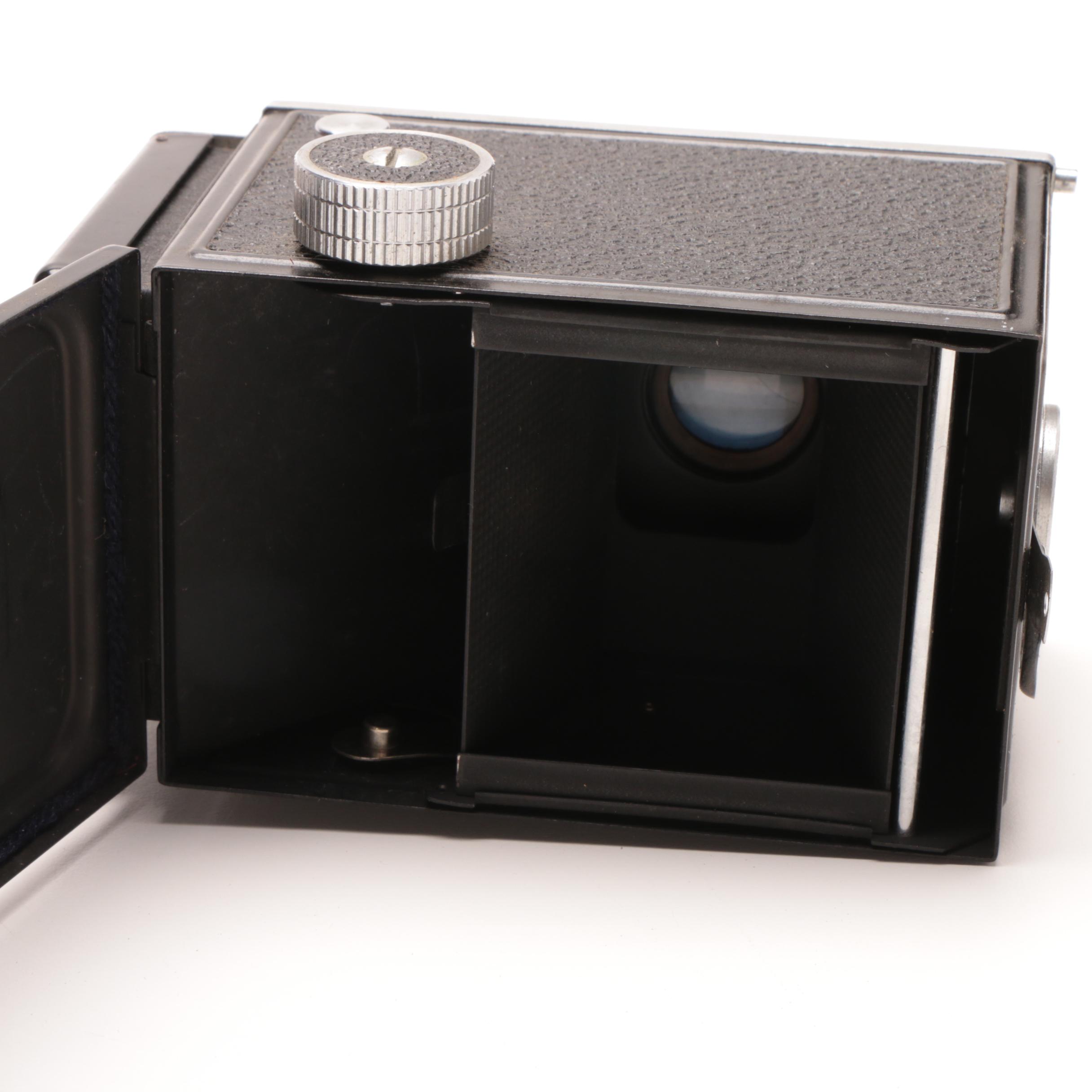 RicohFlex Model VI Camera and Leather Carrier and a Welta Folding Camera