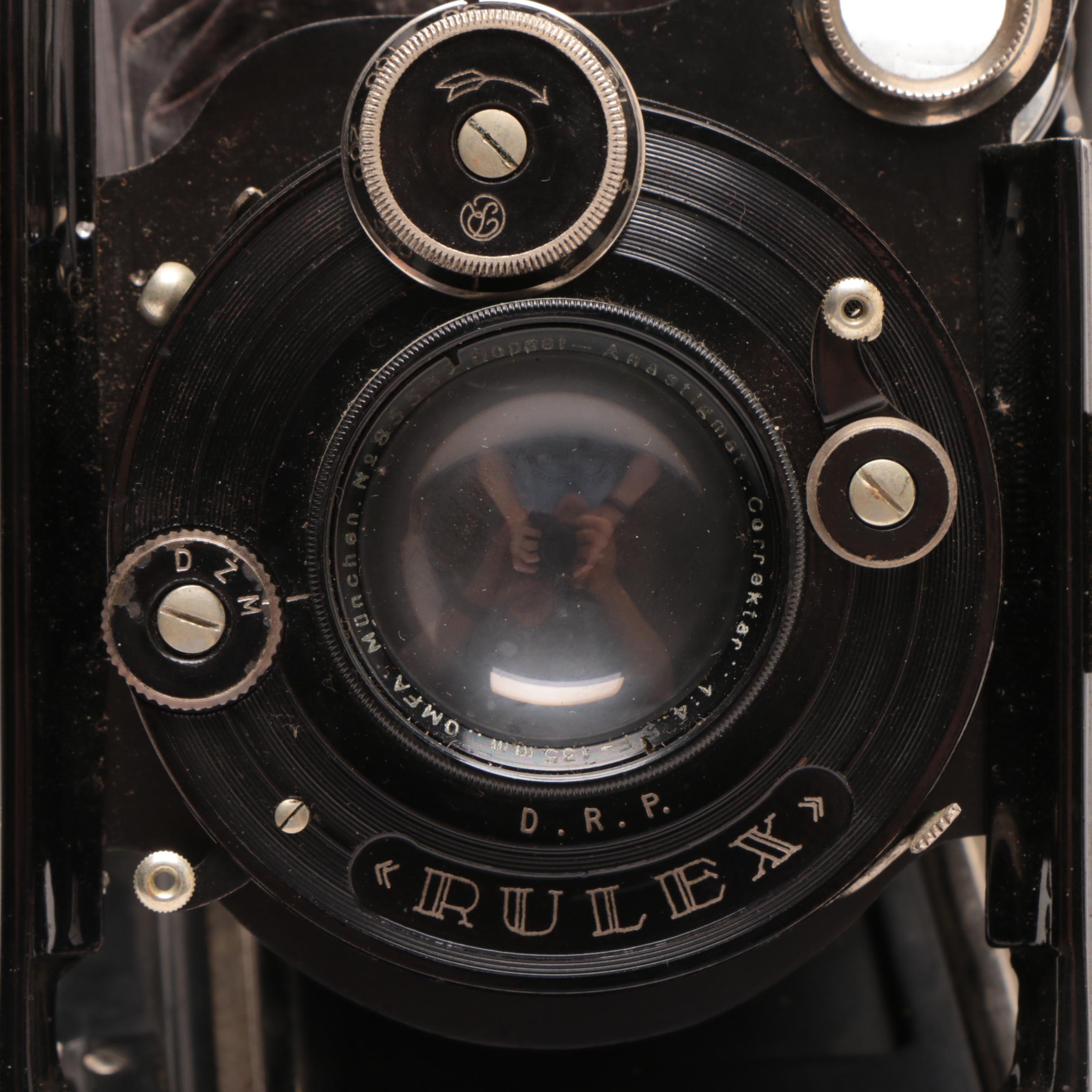 RicohFlex Model VI Camera and Leather Carrier and a Welta Folding Camera