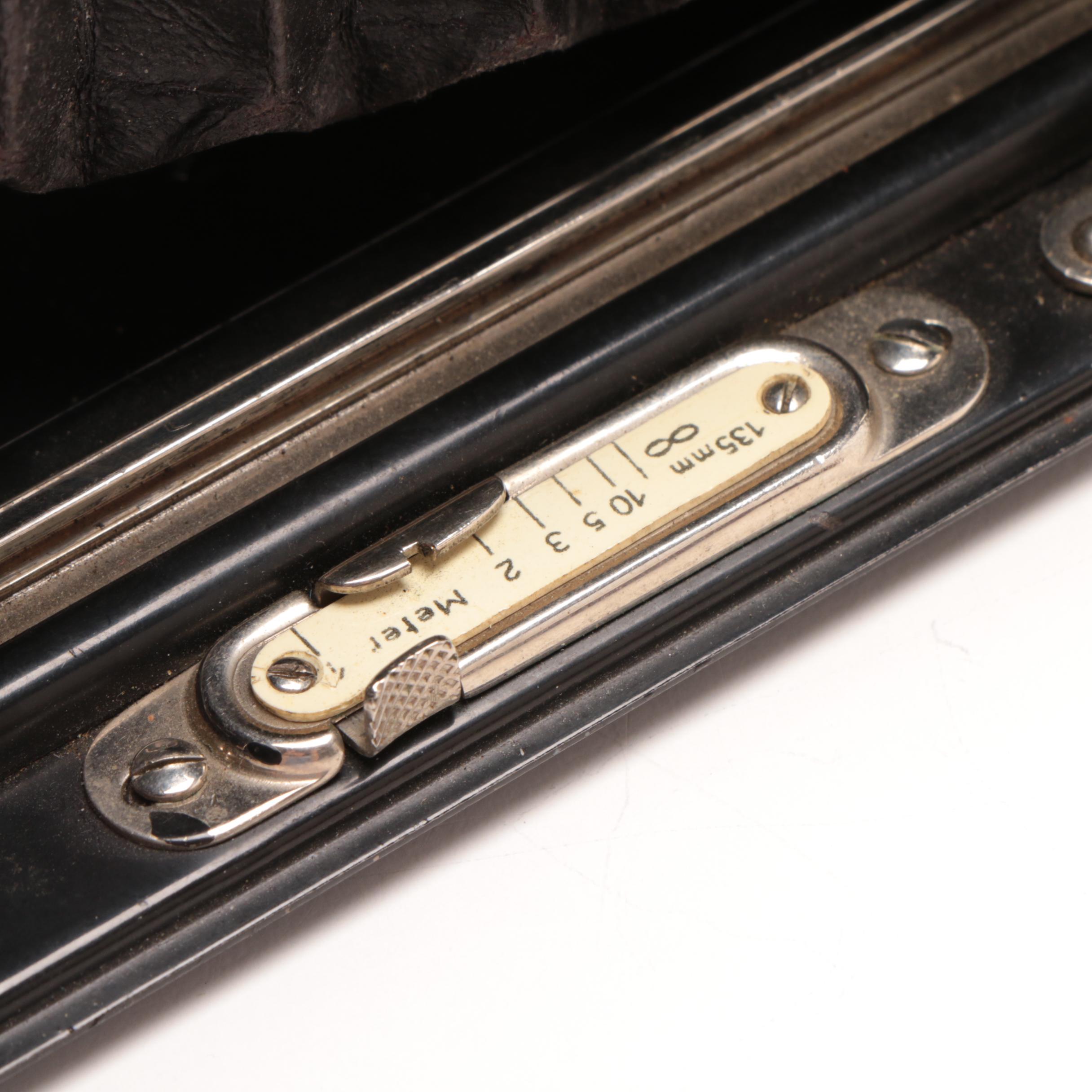 RicohFlex Model VI Camera and Leather Carrier and a Welta Folding Camera