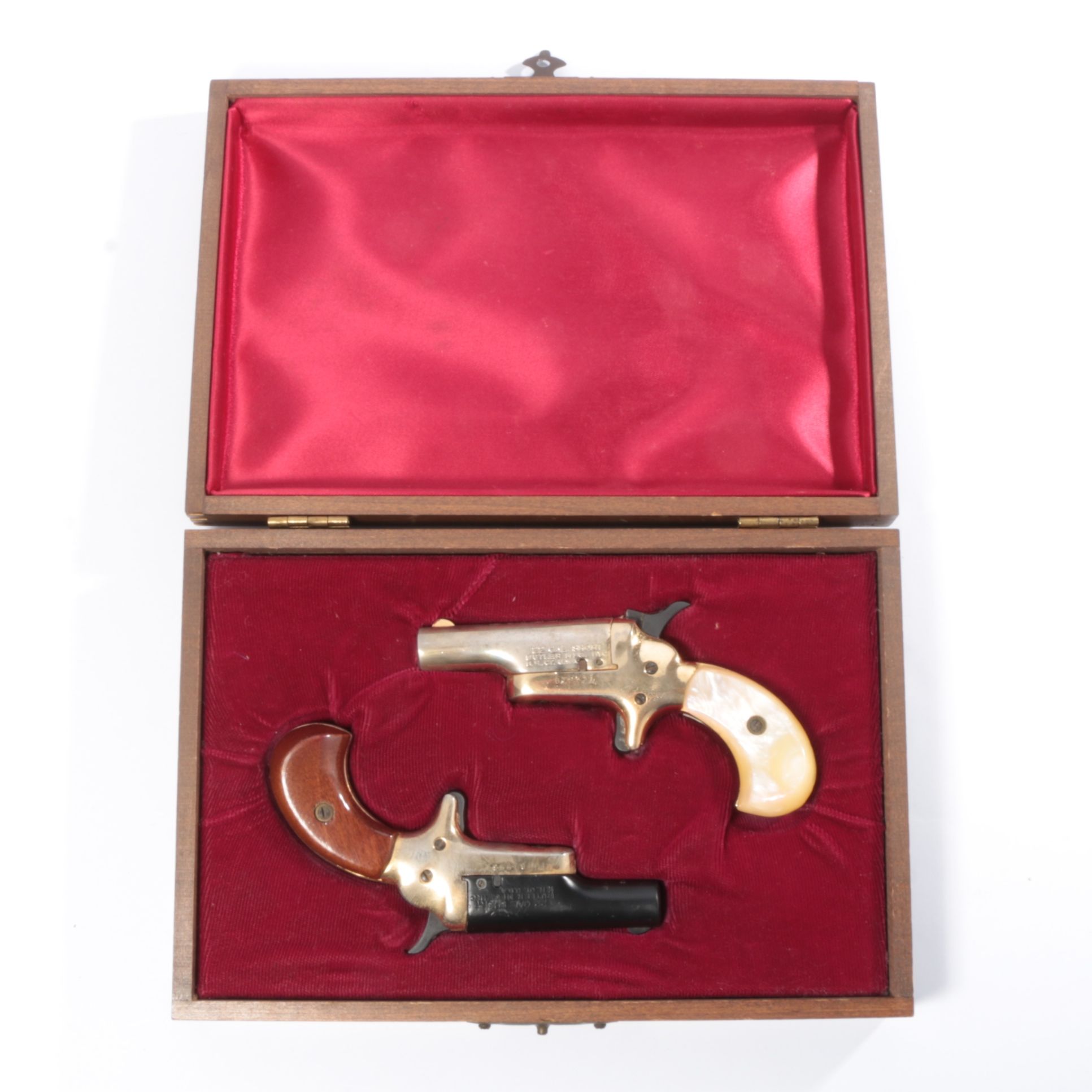 Pair of Butler Single Shot Derringer Type .22 Short Pistols in Presentation Case