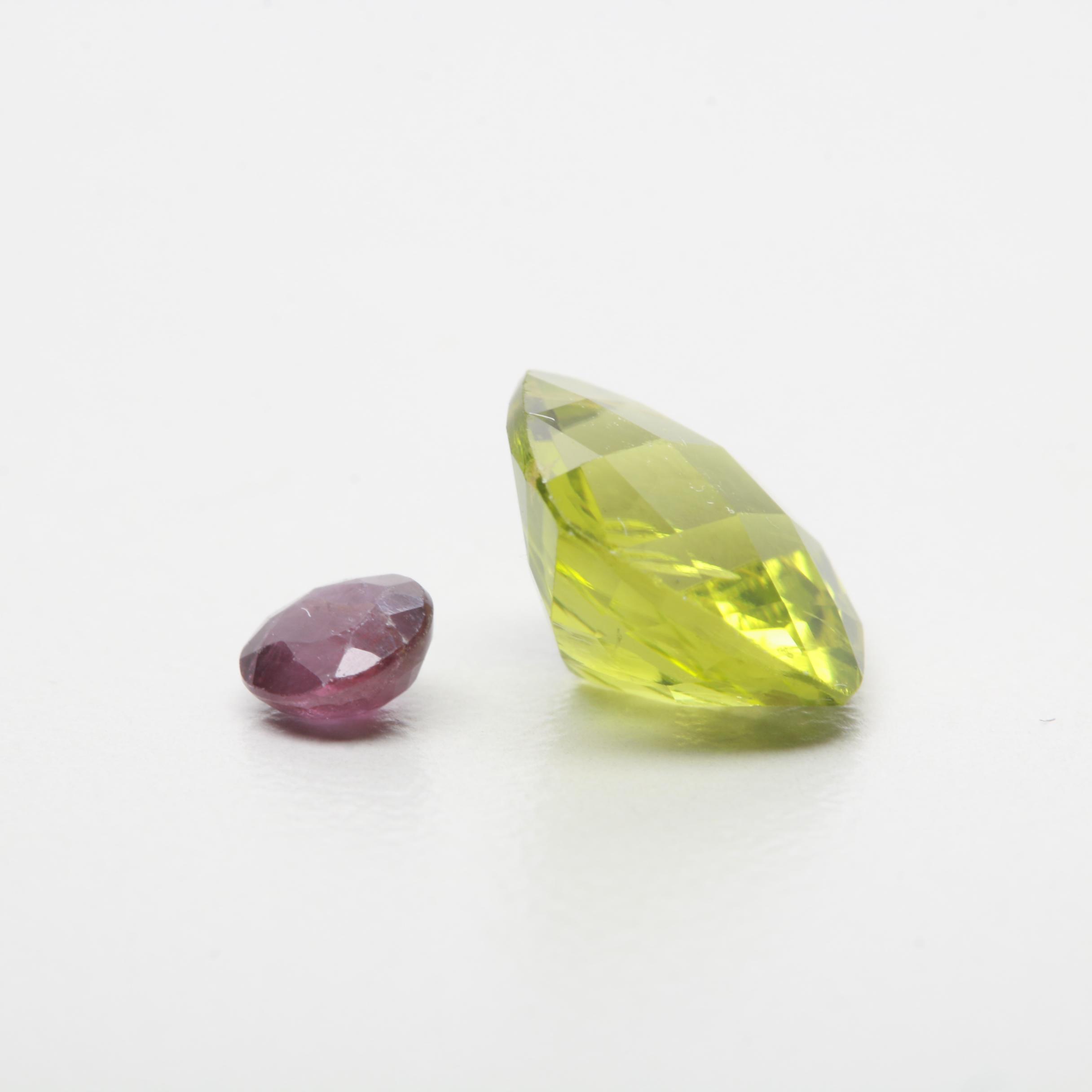Assorted 23.38 CTW Loose Peridot and Heat Treated Rubies