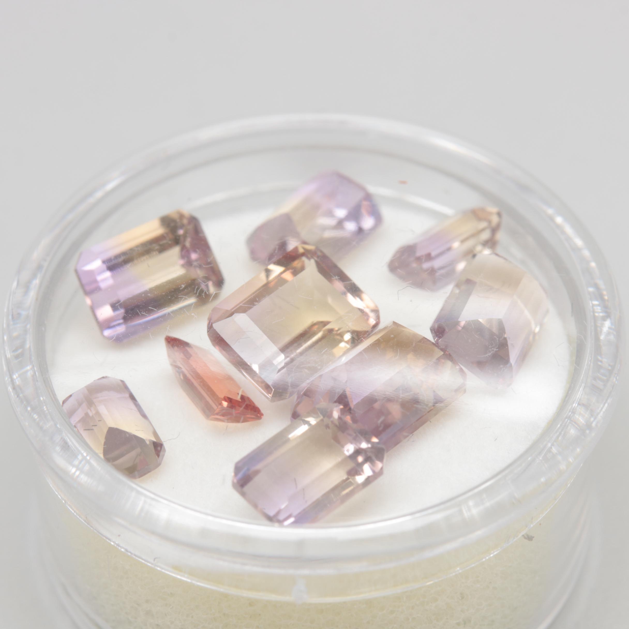 Loose Assorted Faceted 64.35 CTW Gemstones Including Citrine and Ametrine