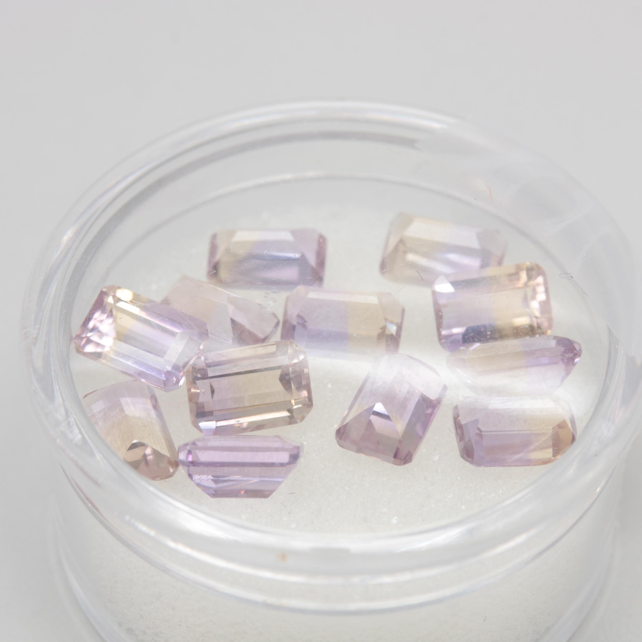 Loose Assorted Faceted 64.35 CTW Gemstones Including Citrine and Ametrine