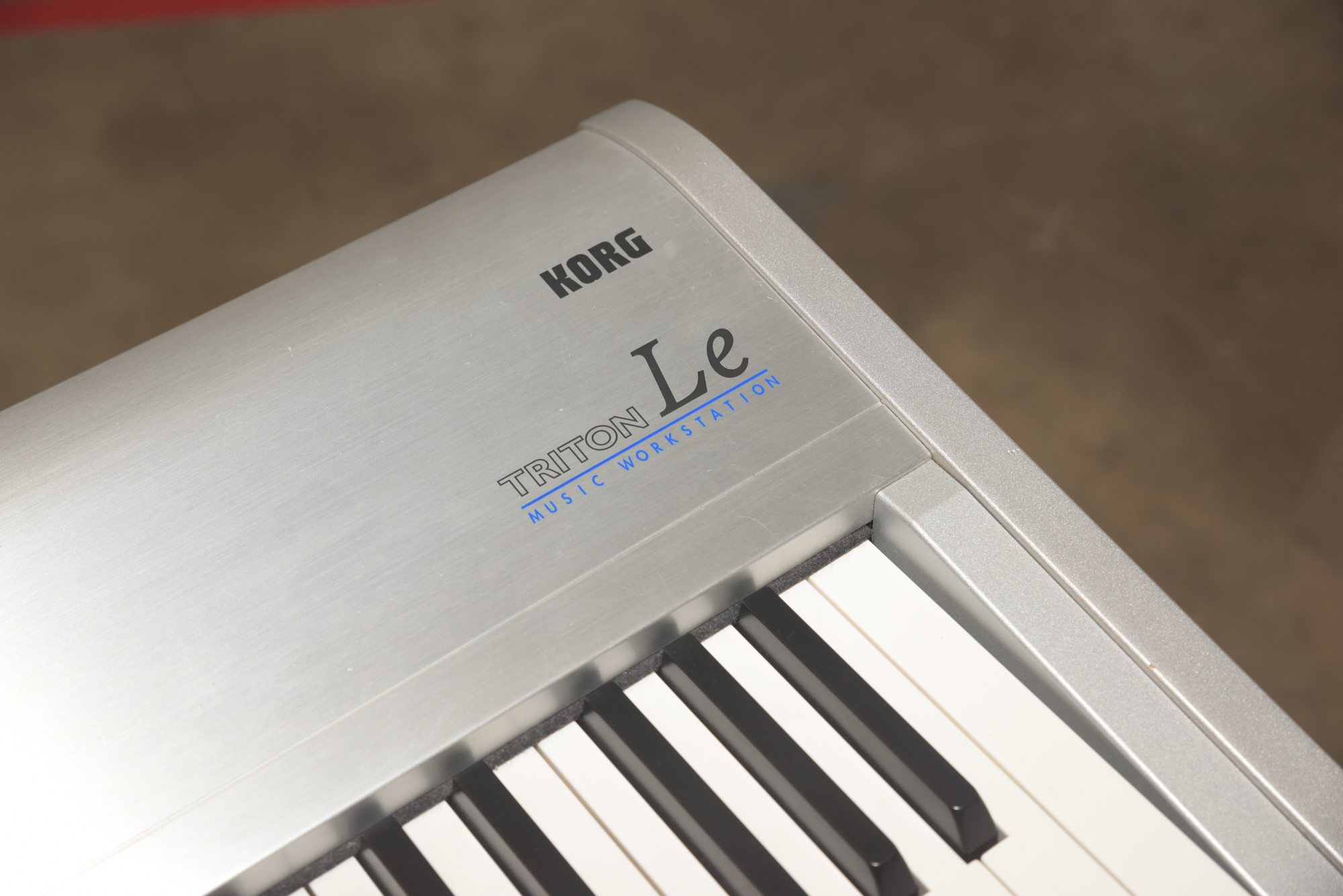 Korg Triton Le 88 Keyboard with Stand and Travel Case