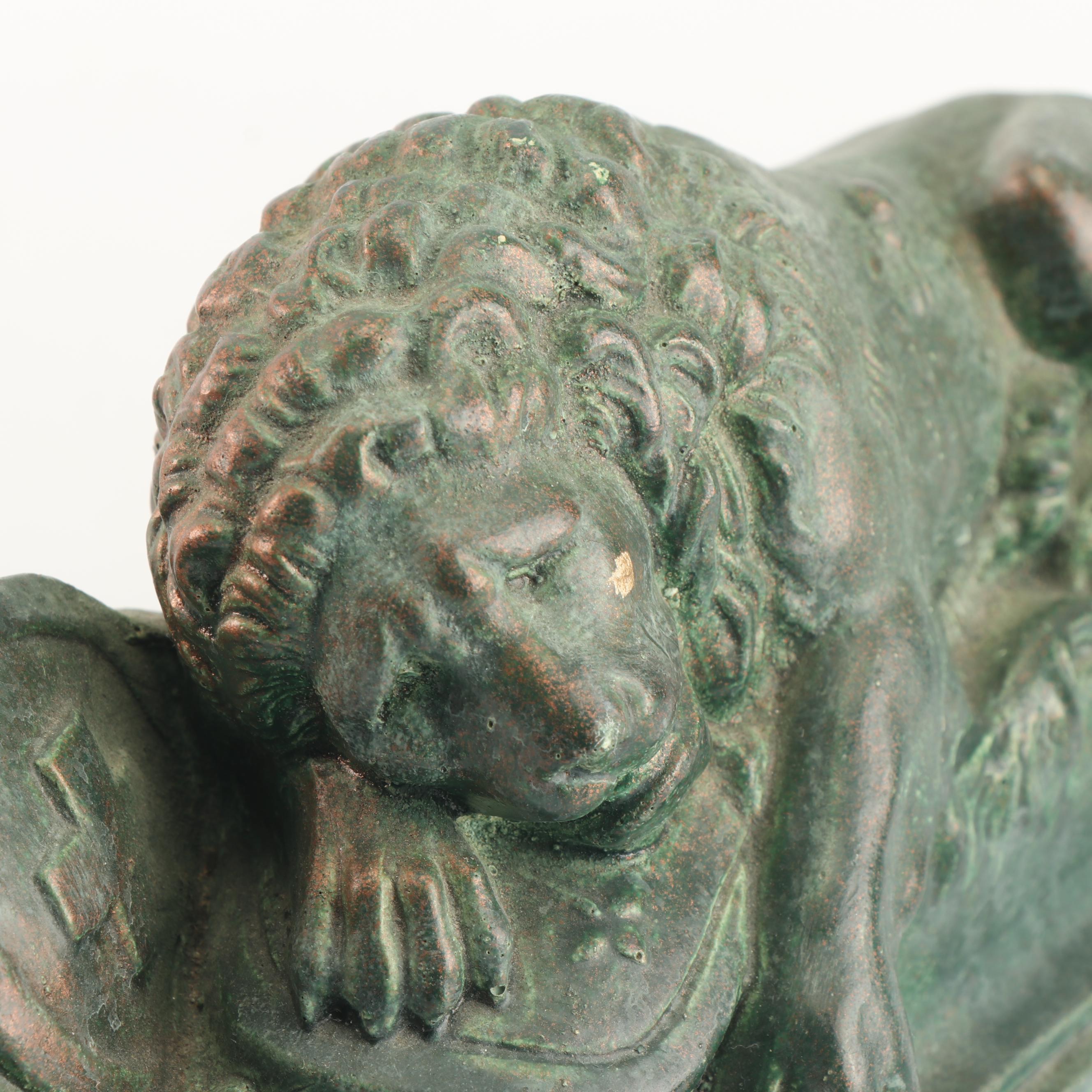 Blackamoor Nubian Figurine with Embossed Brass Vessels and "Lion of Lucerne"