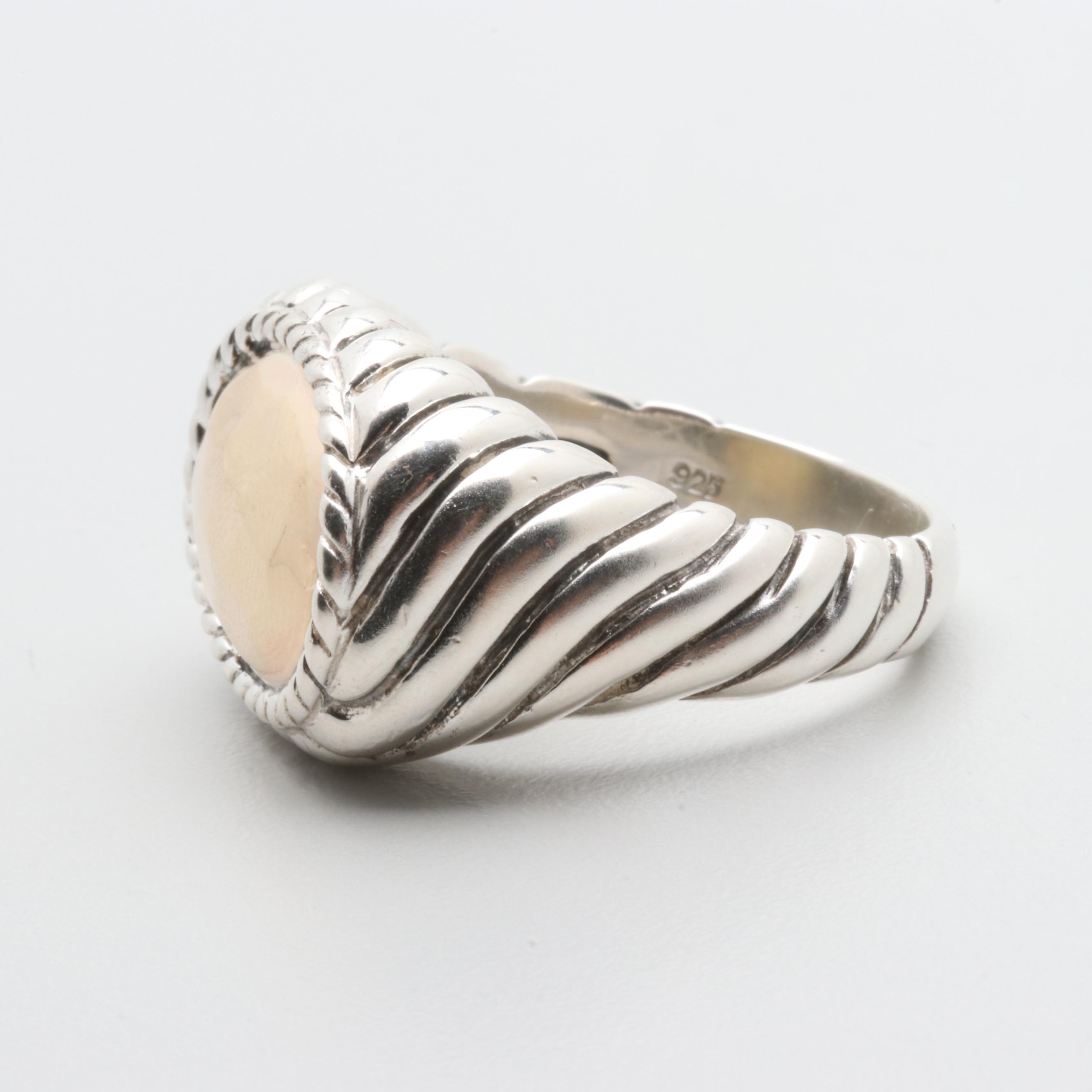 Sterling Silver Textured Ring with a 14K Yellow Gold Center