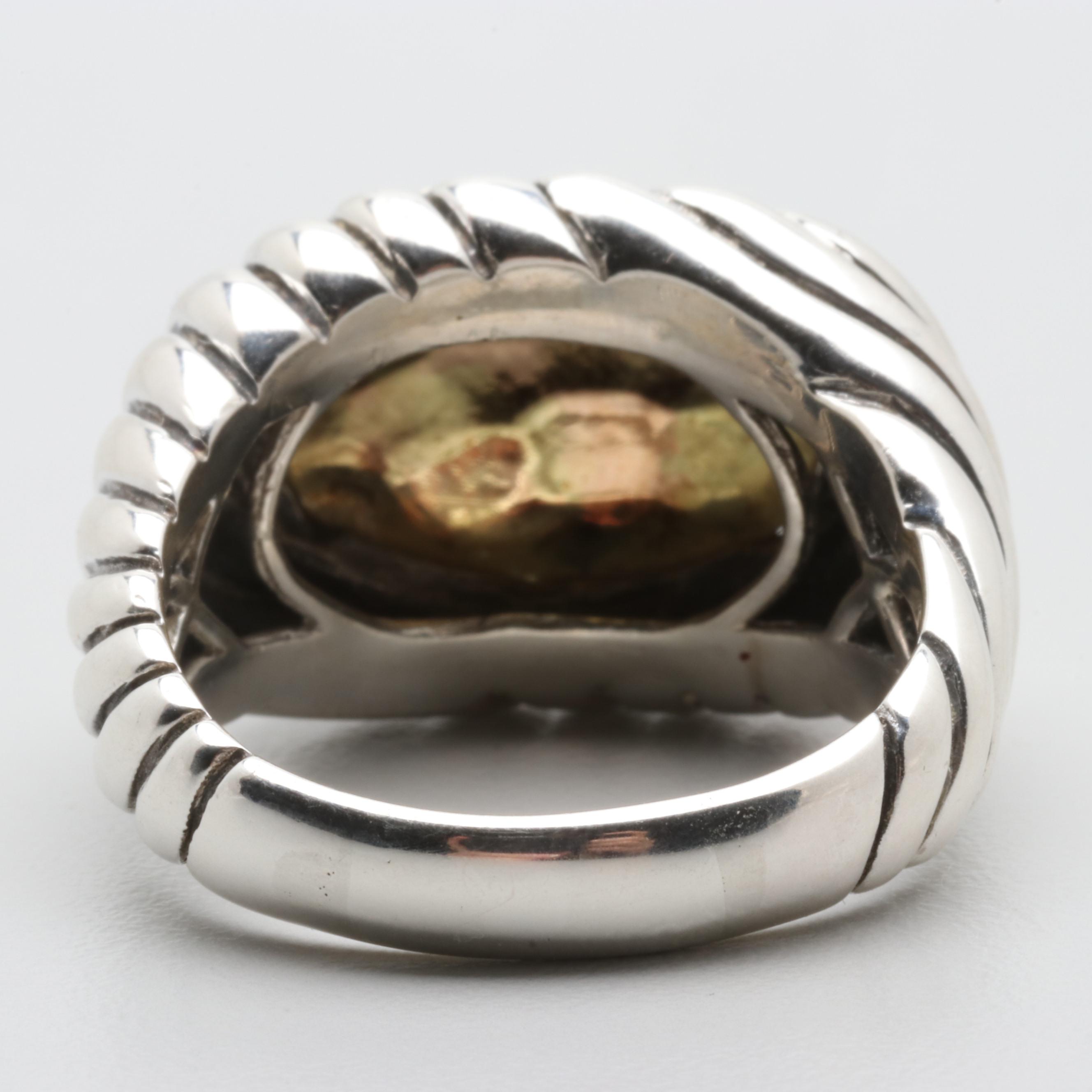 Sterling Silver Textured Ring with a 14K Yellow Gold Center