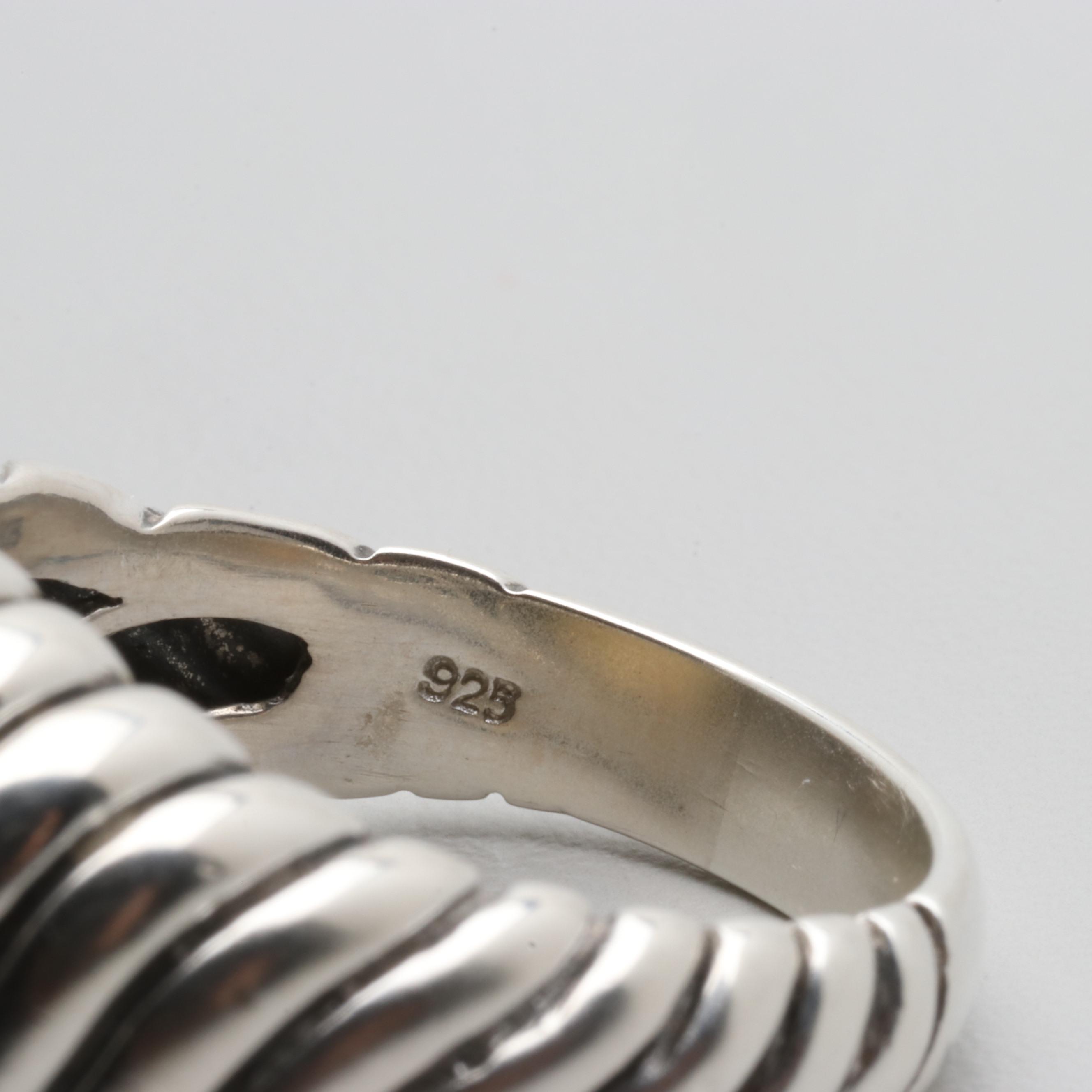 Sterling Silver Textured Ring with a 14K Yellow Gold Center