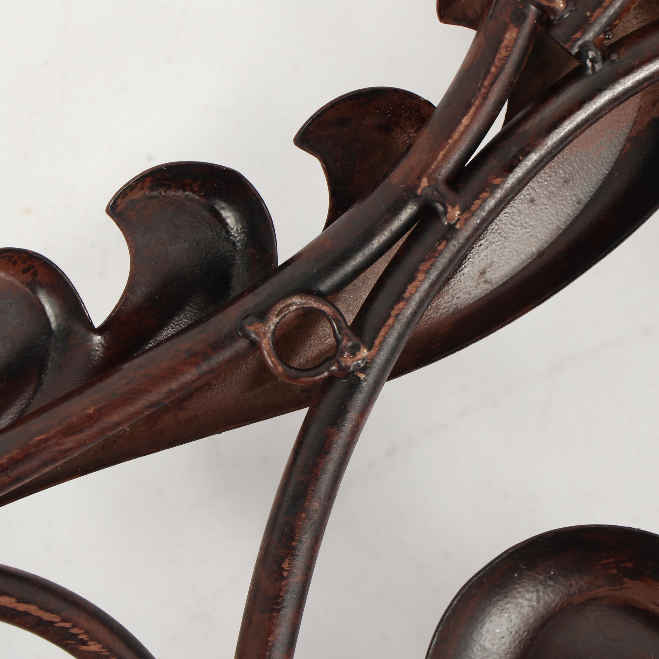 Scrolled Metal Wall Plaque with Leaf Decoration