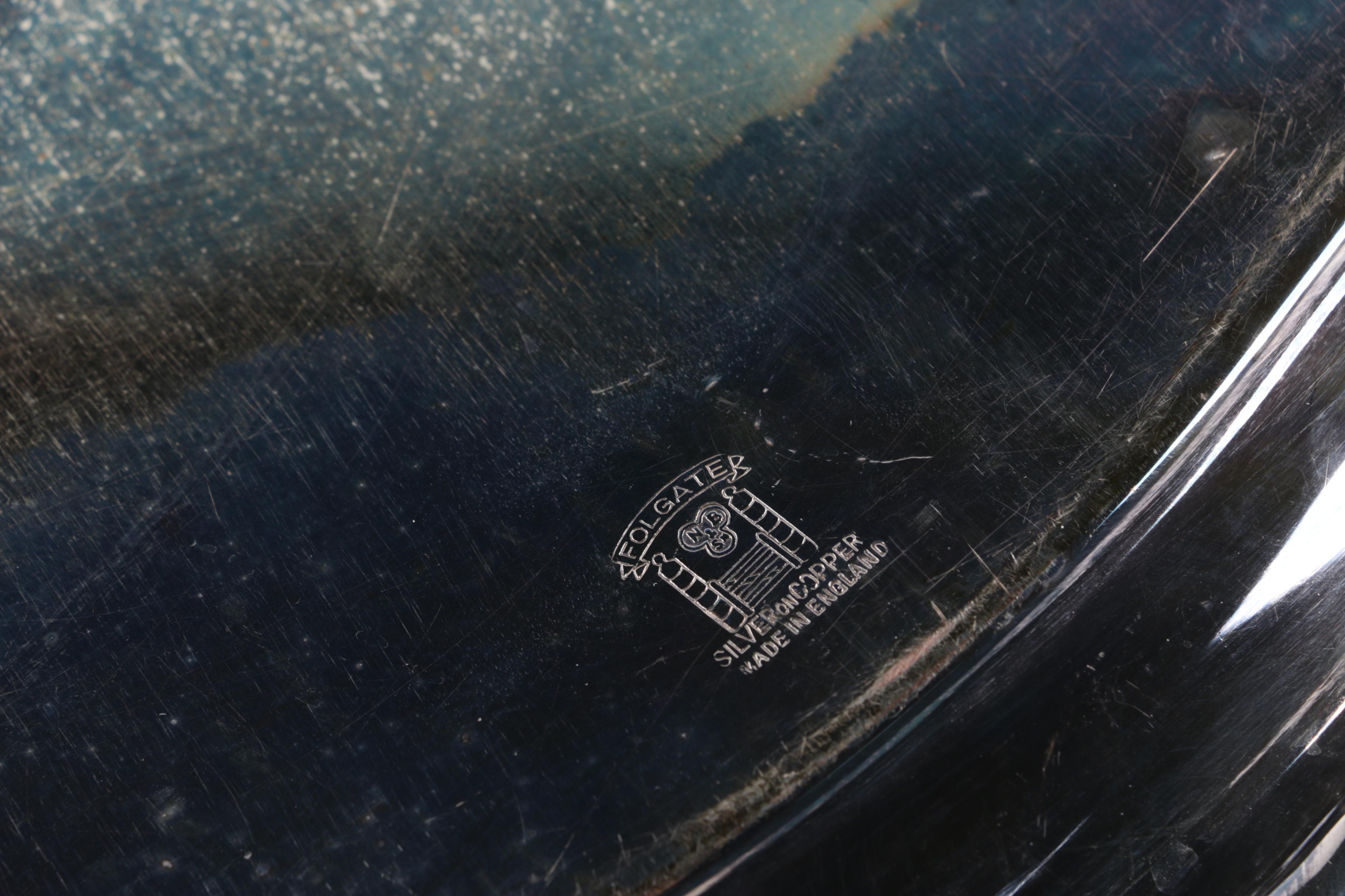 Graff, Washbourne & Dunn Sterling Overlaid Trivet with Silver Plate Serveware