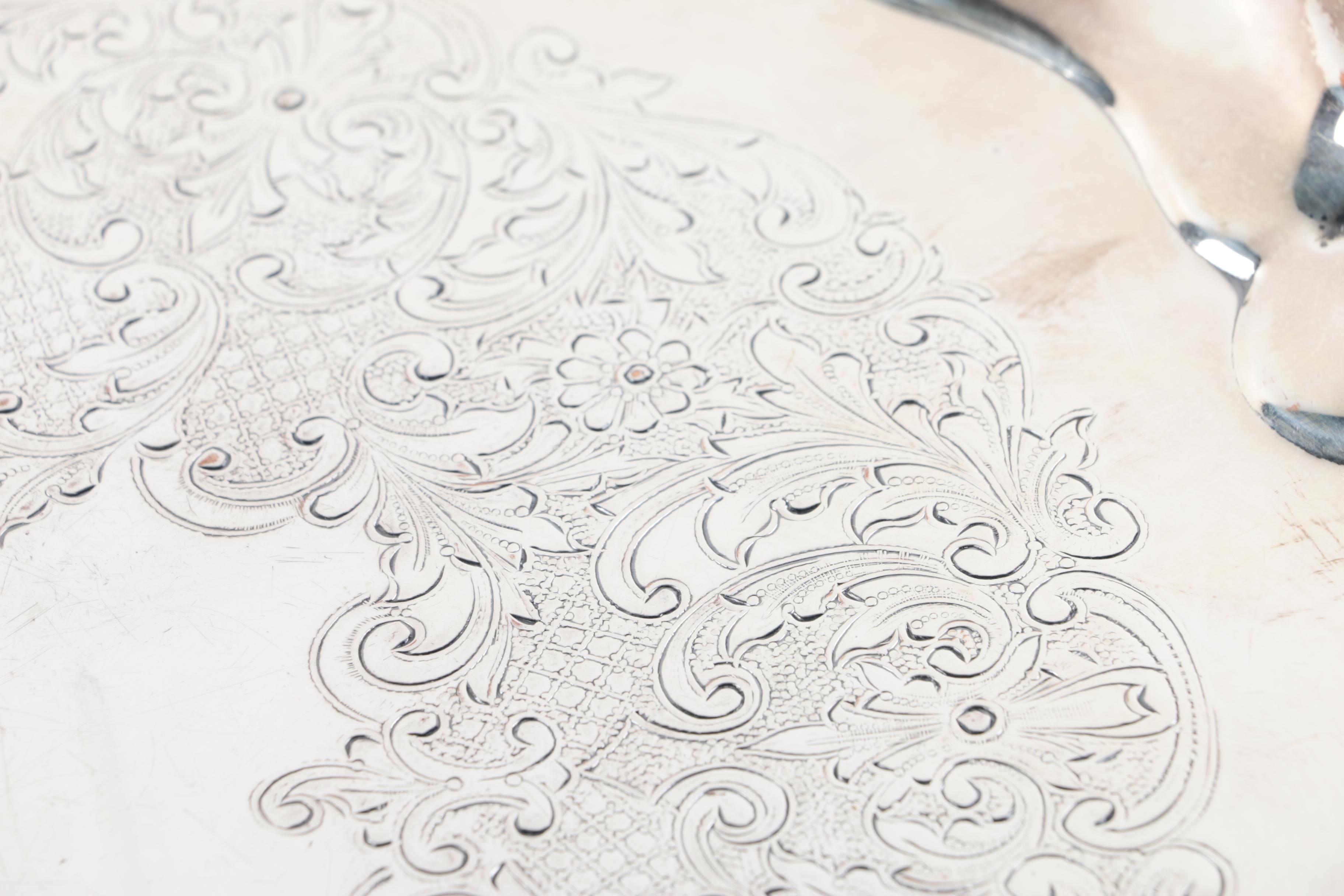 Graff, Washbourne & Dunn Sterling Overlaid Trivet with Silver Plate Serveware