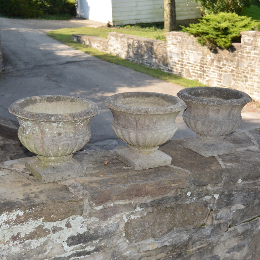 Three Low Urn-Shaped Concrete Garden Planters