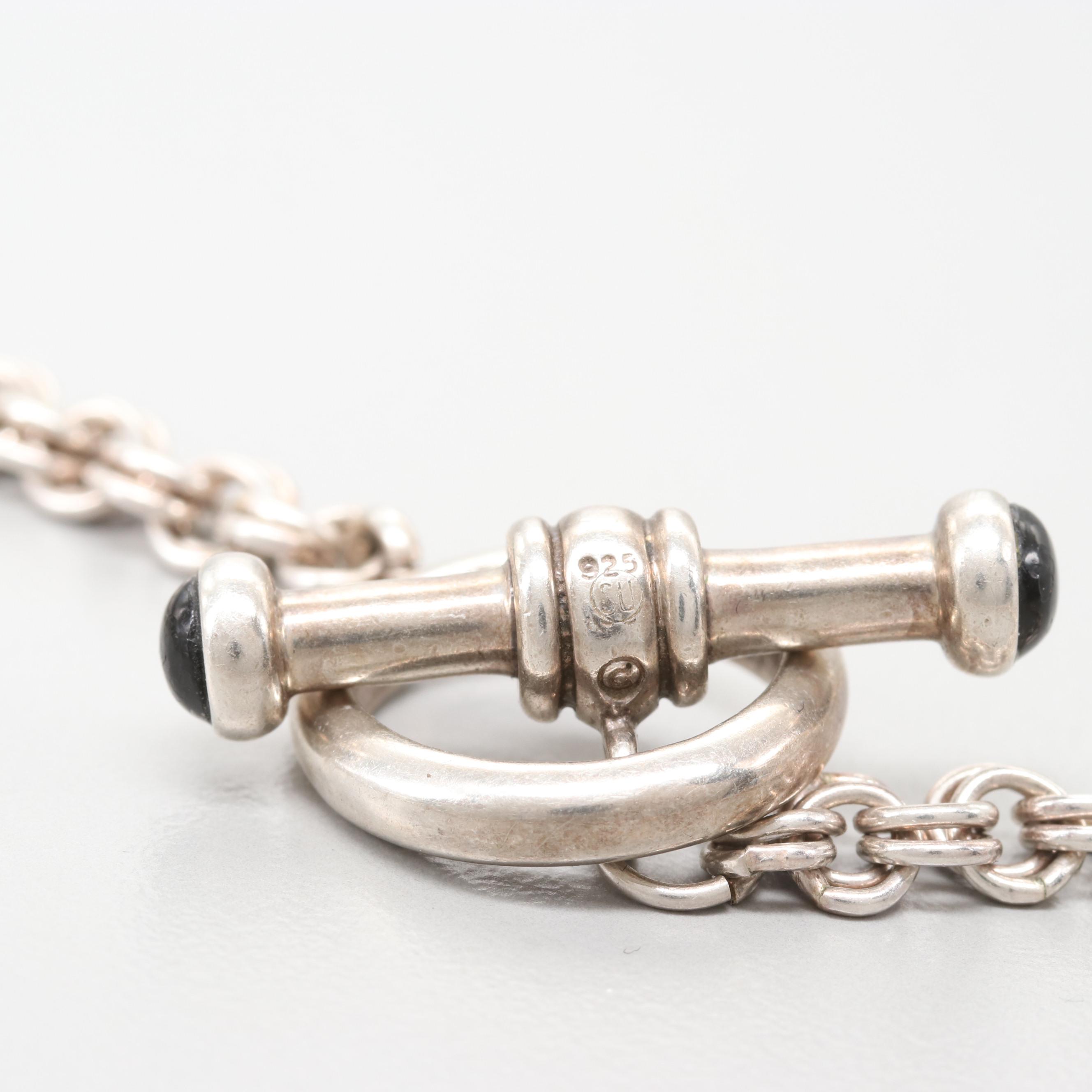 Sterling Silver Jewelry Assortment Including Garnet and Onyx