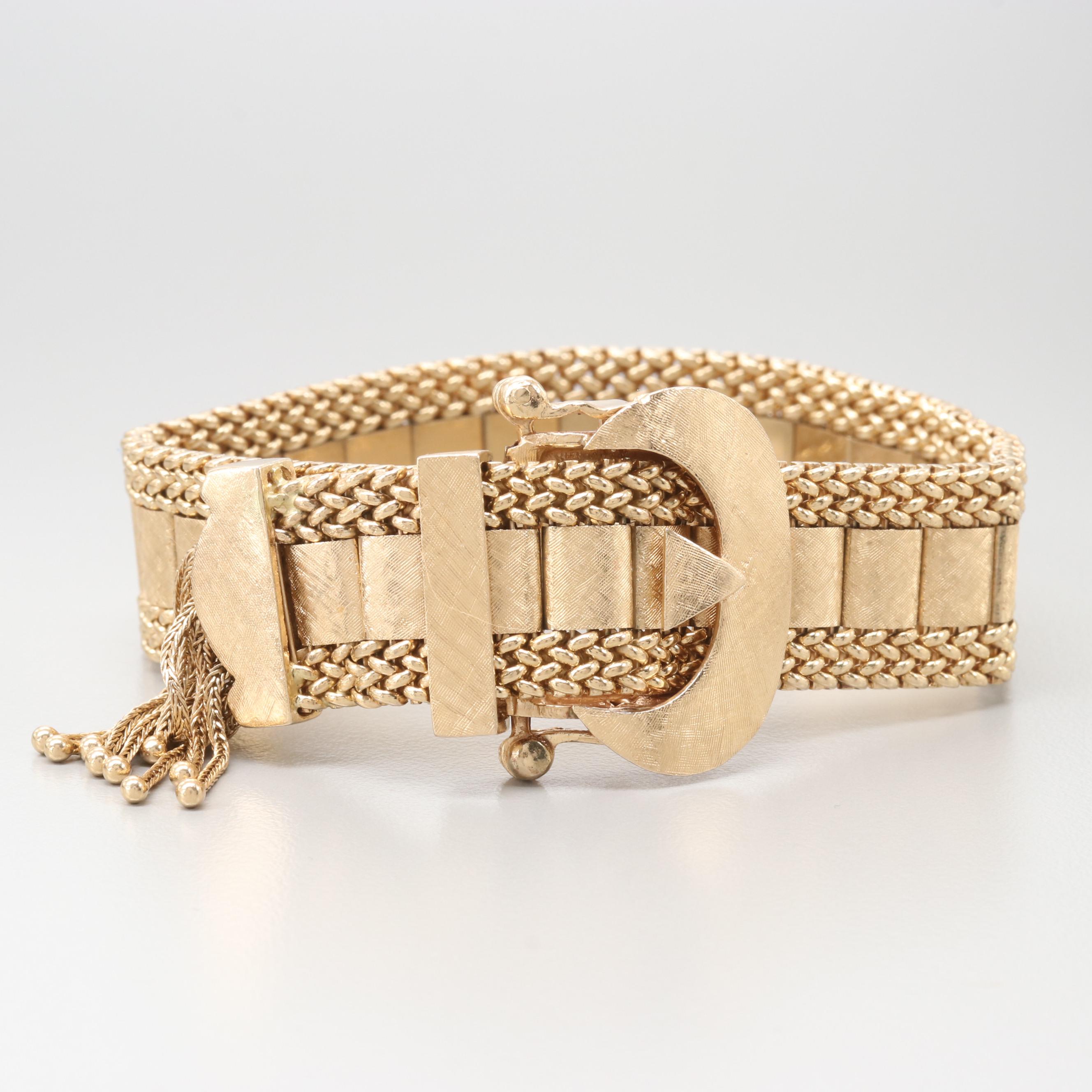 Circa 1940's Taylor & Co. 14K Yellow Gold Articulated Slide Bracelet