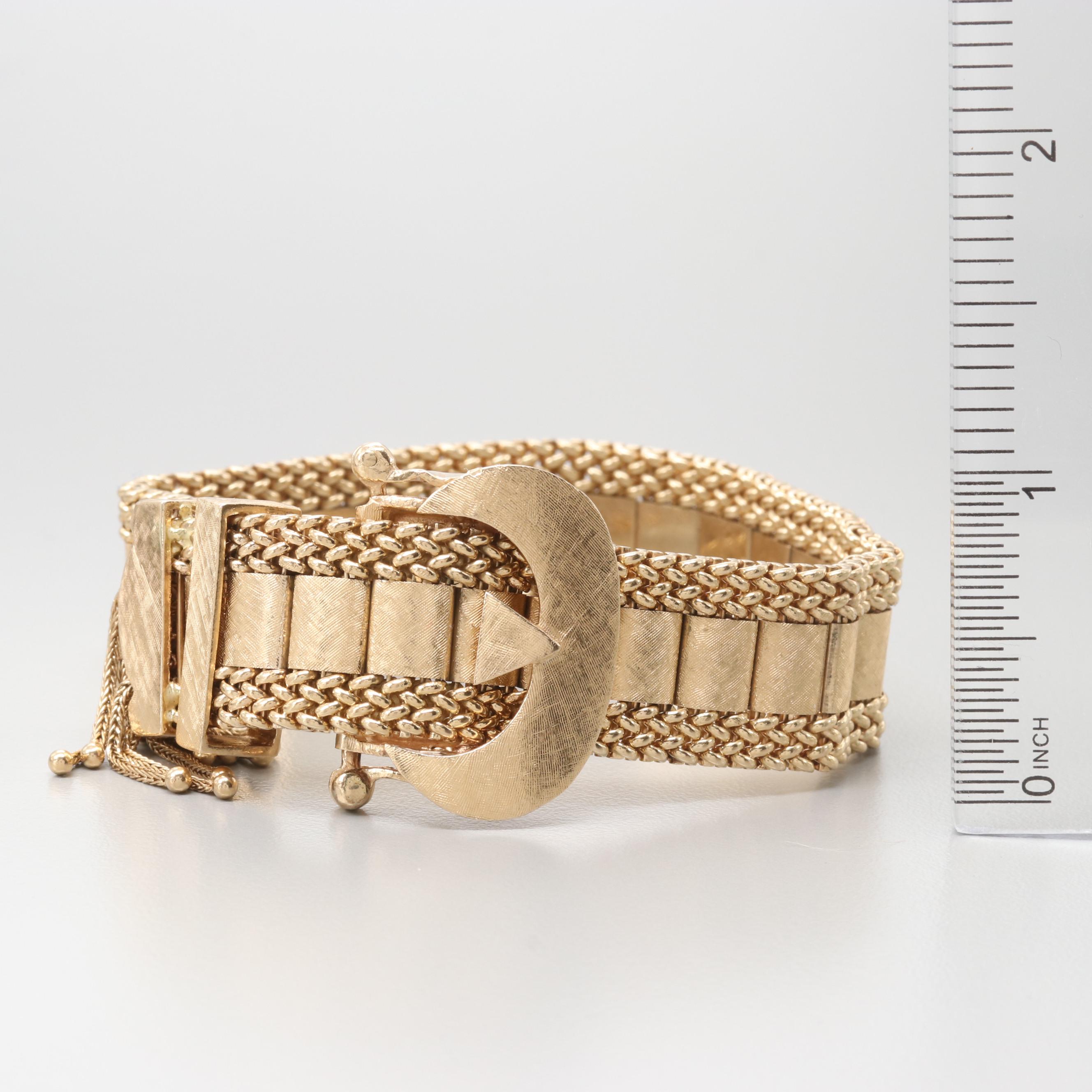 Circa 1940's Taylor & Co. 14K Yellow Gold Articulated Slide Bracelet