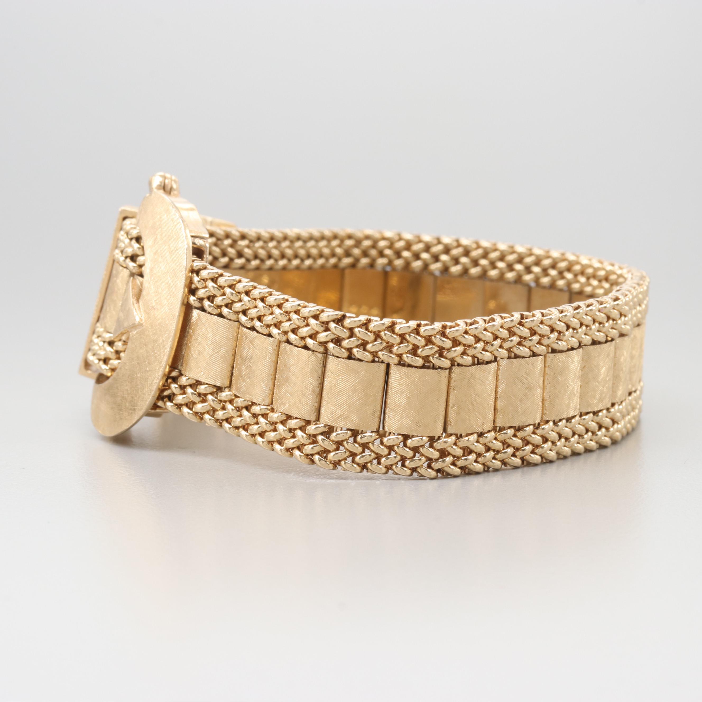 Circa 1940's Taylor & Co. 14K Yellow Gold Articulated Slide Bracelet