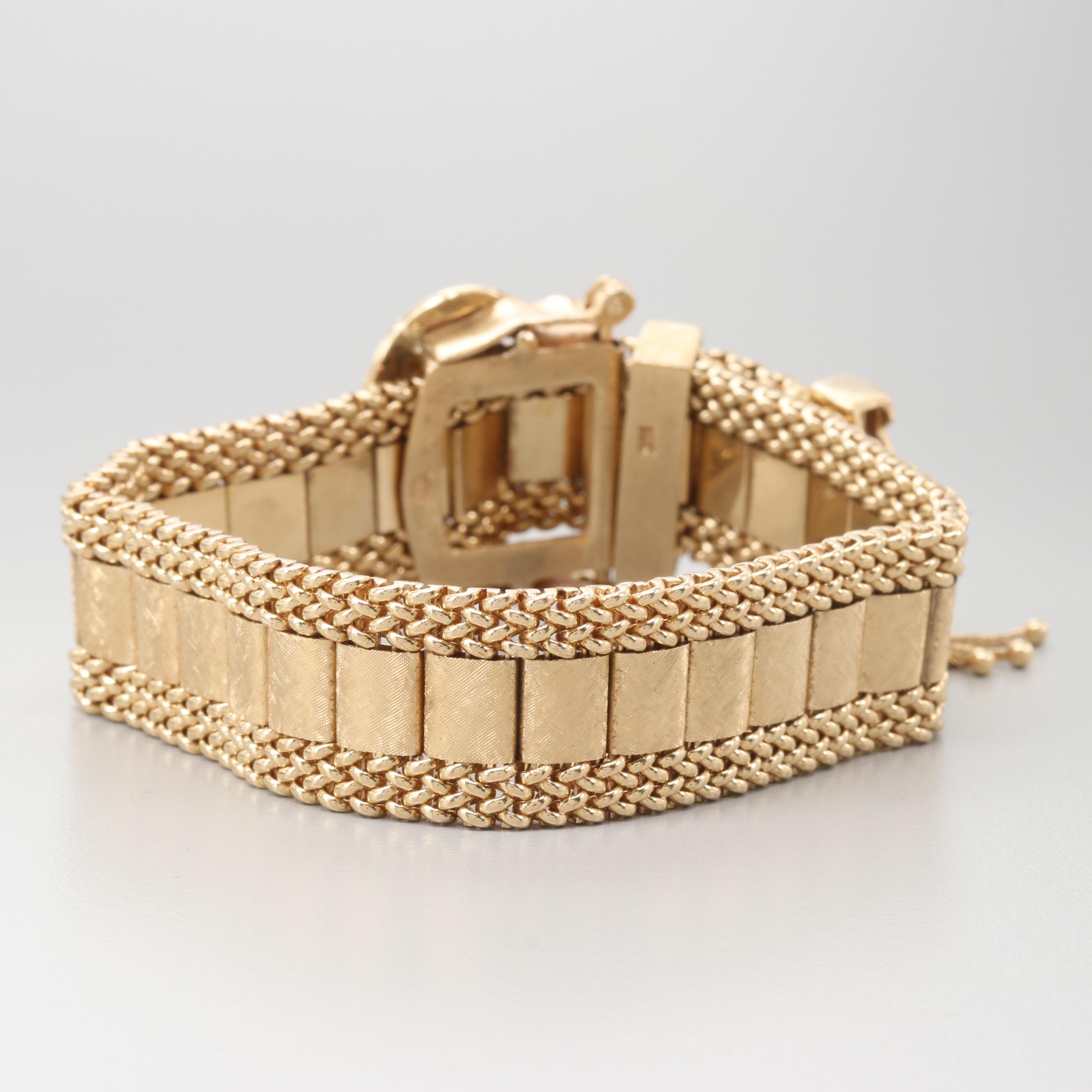 Circa 1940's Taylor & Co. 14K Yellow Gold Articulated Slide Bracelet