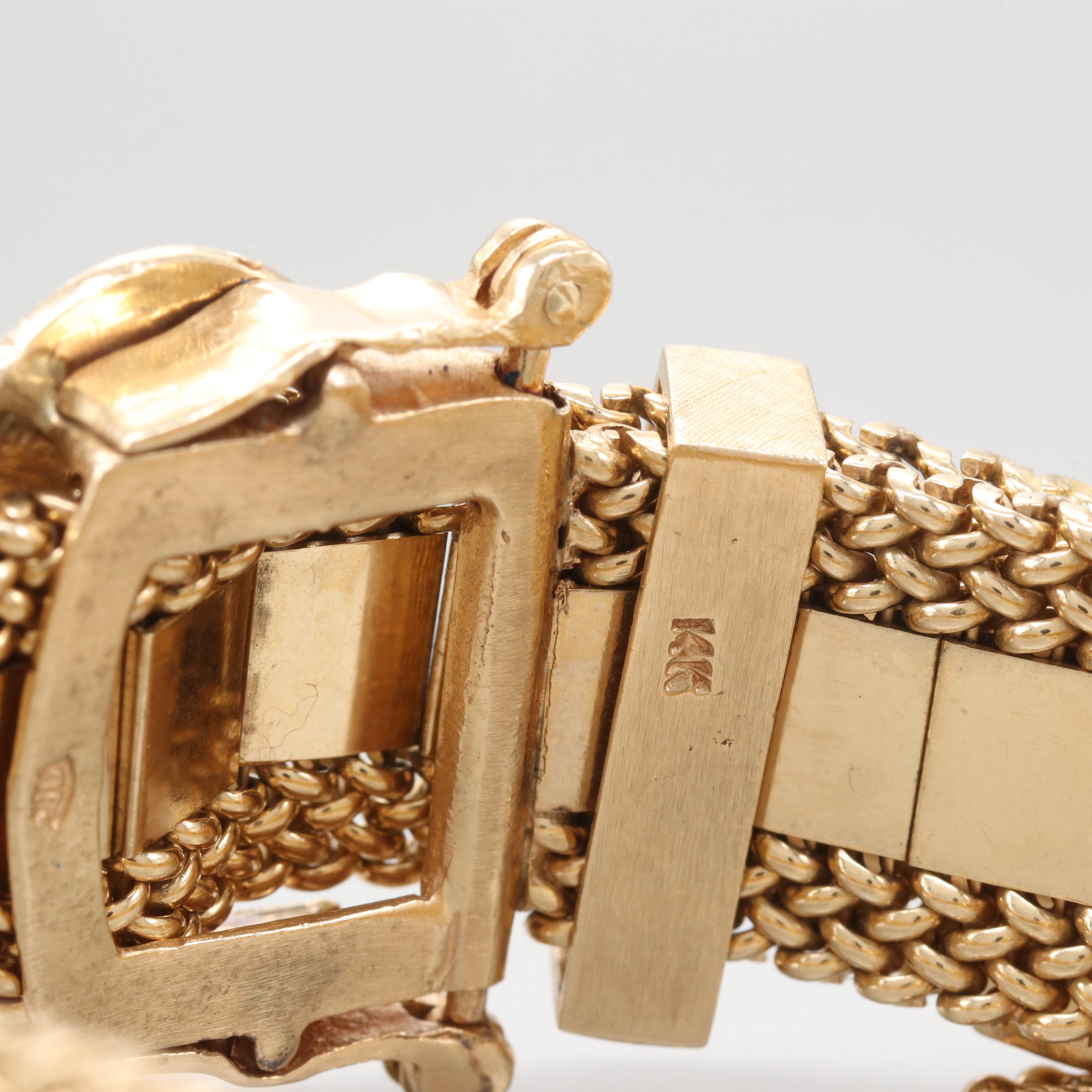 Circa 1940's Taylor & Co. 14K Yellow Gold Articulated Slide Bracelet