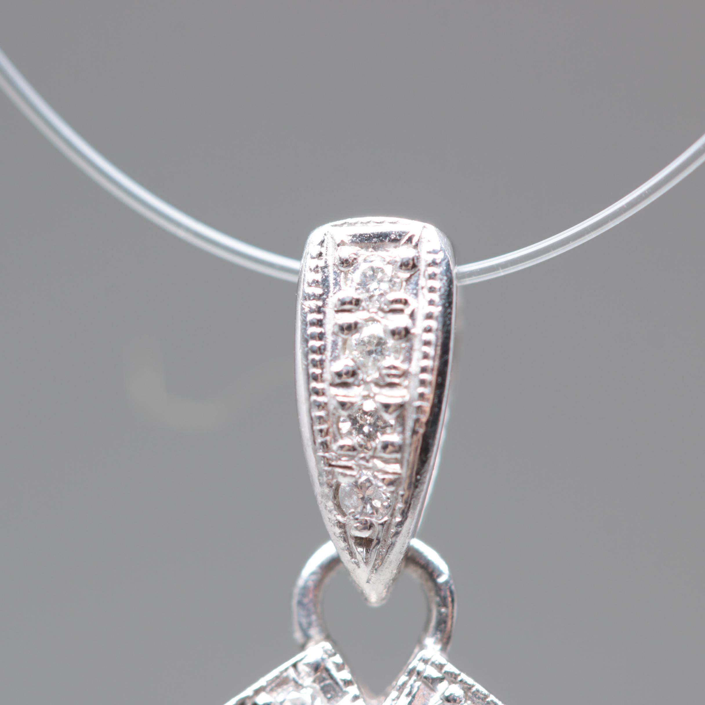 Platinum Emerald and Diamond Openwork Pendant