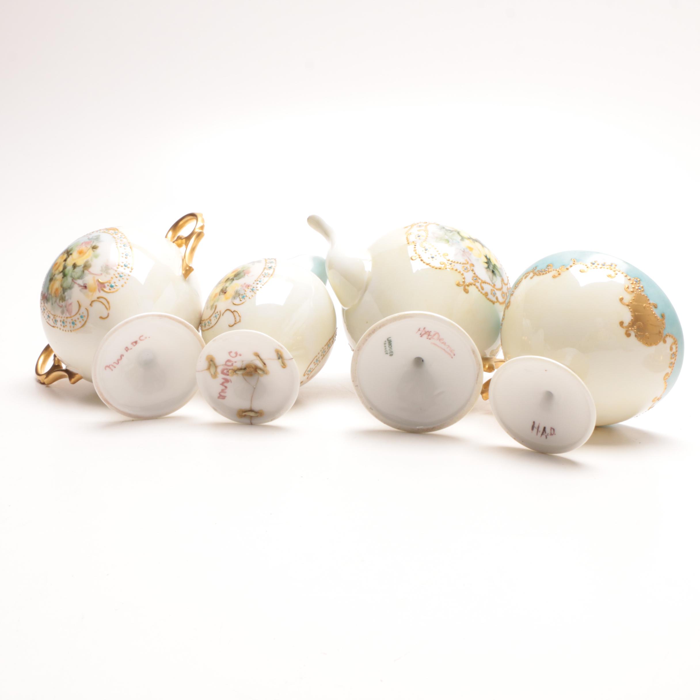 French Limoges and Arnart Demitasse Cups in Ornamental Cup Holders