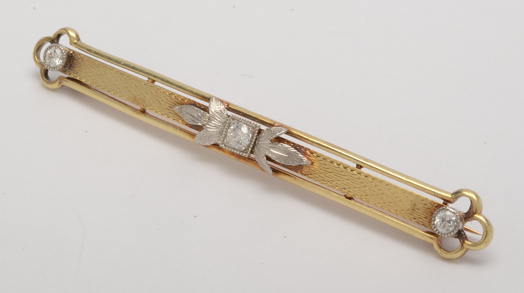 Circa 1910s 14K Yellow Gold Diamond Brooch with Platinum Accents