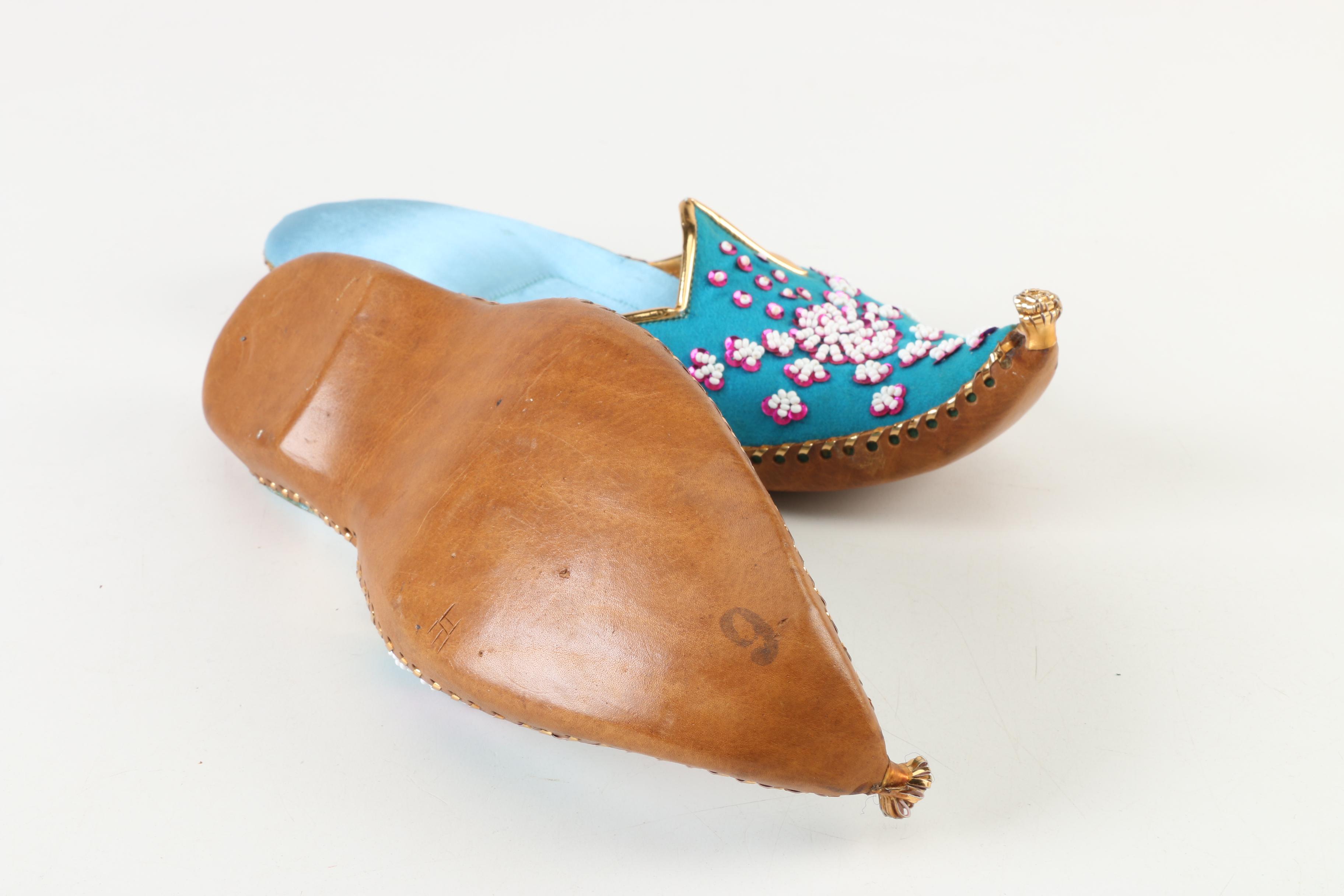 Women's Khussa Shoes with Thai Dancer Figurines and Elephant Figurine