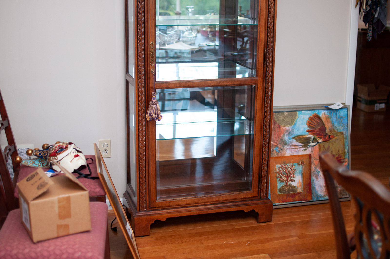 Neoclassical Style Walnut Finish "Armand" Curio Cabinet by Howard Miller