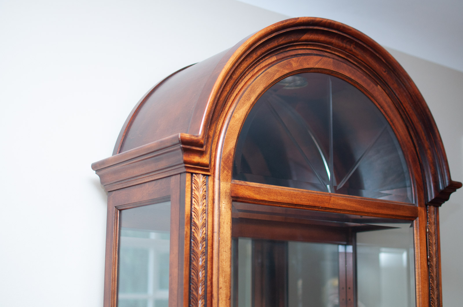 Neoclassical Style Walnut Finish "Armand" Curio Cabinet by Howard Miller