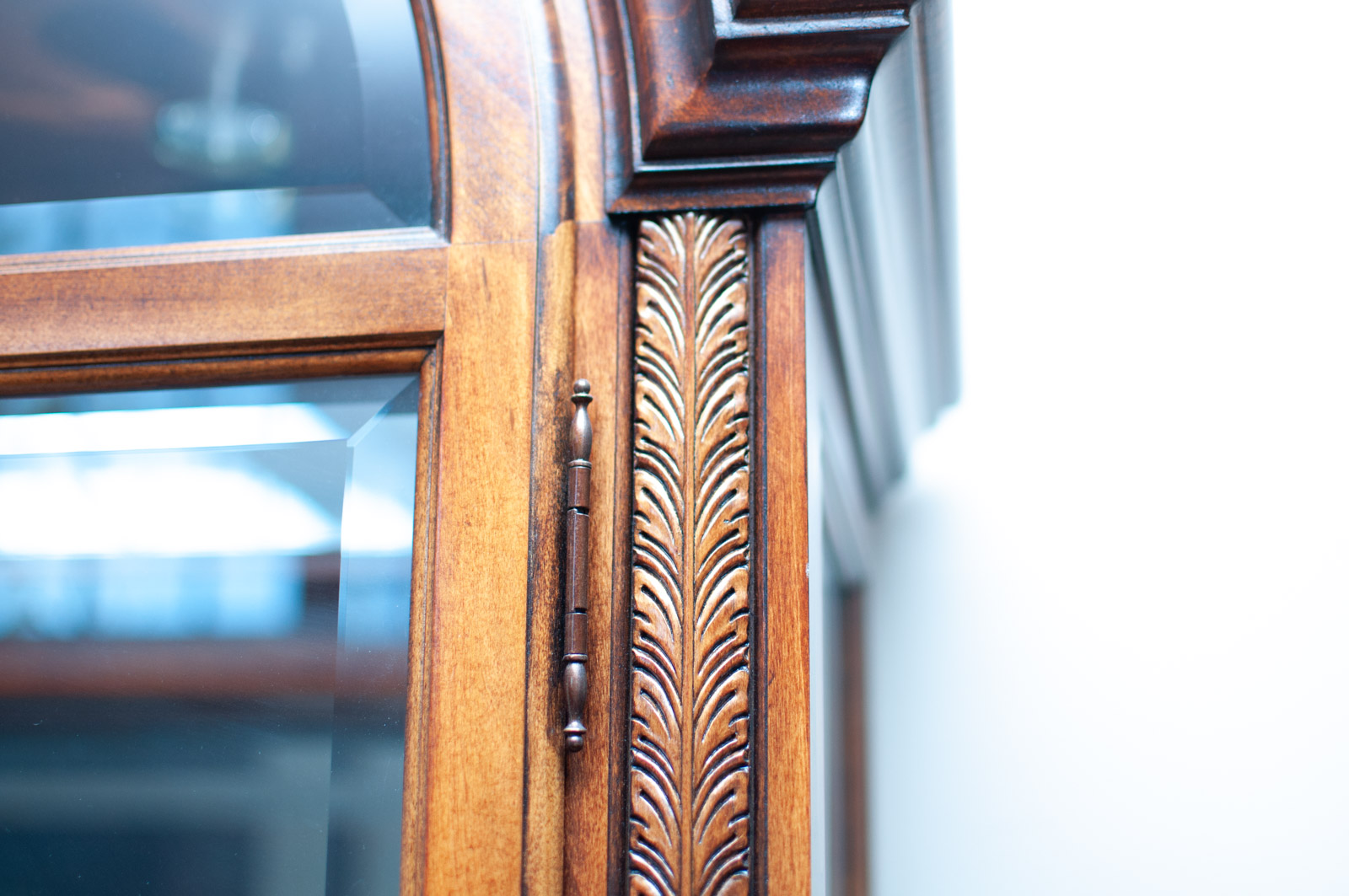 Neoclassical Style Walnut Finish "Armand" Curio Cabinet by Howard Miller