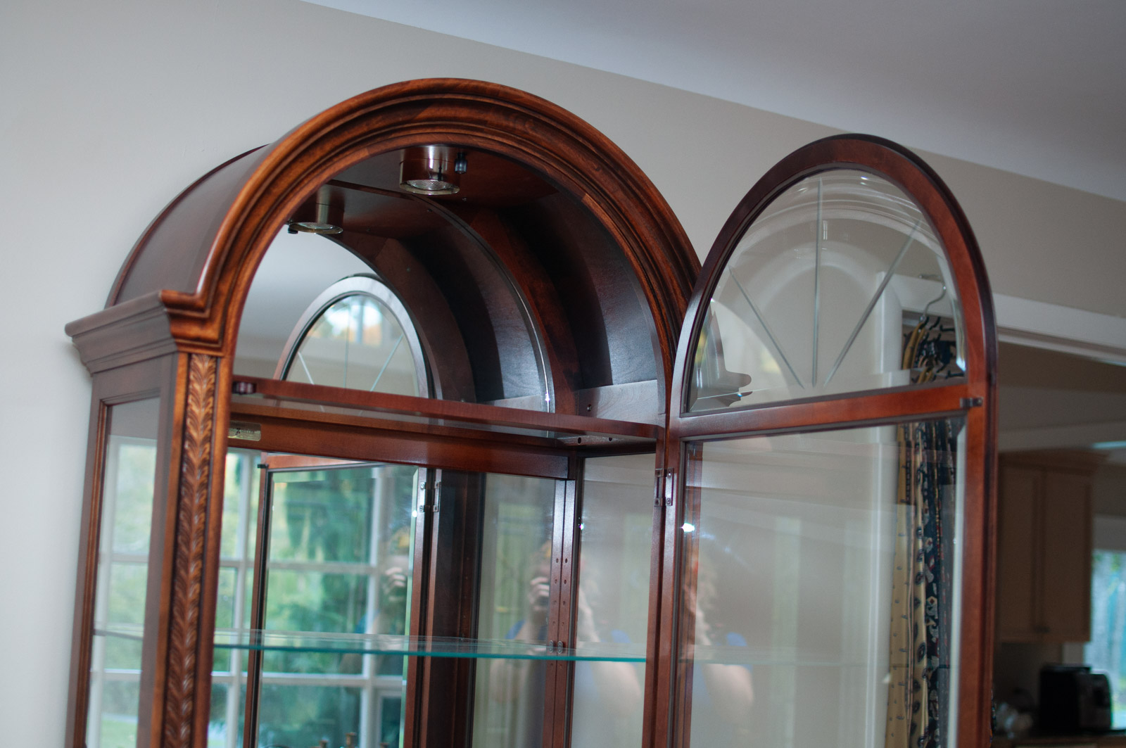 Neoclassical Style Walnut Finish "Armand" Curio Cabinet by Howard Miller